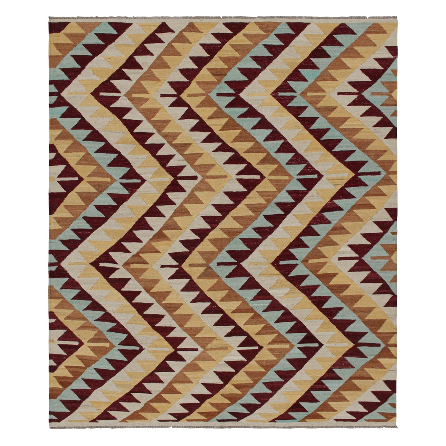 Rug 
Kilim è un kilim in stile tribale con motivi geometrici rossi, blu e beige-marrone. in vendita