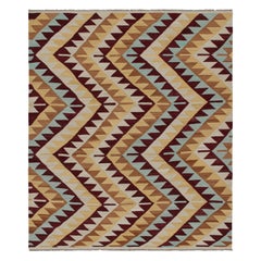 Tribal Style Kilim von Rug
Kilim in Rot, Blau und Beige-Braun mit geometrischen Mustern