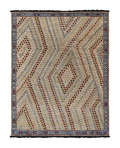 Tappeto in stile tribale Rug & Kilim in beige con motivi geometrici rossi, blu e bianchi