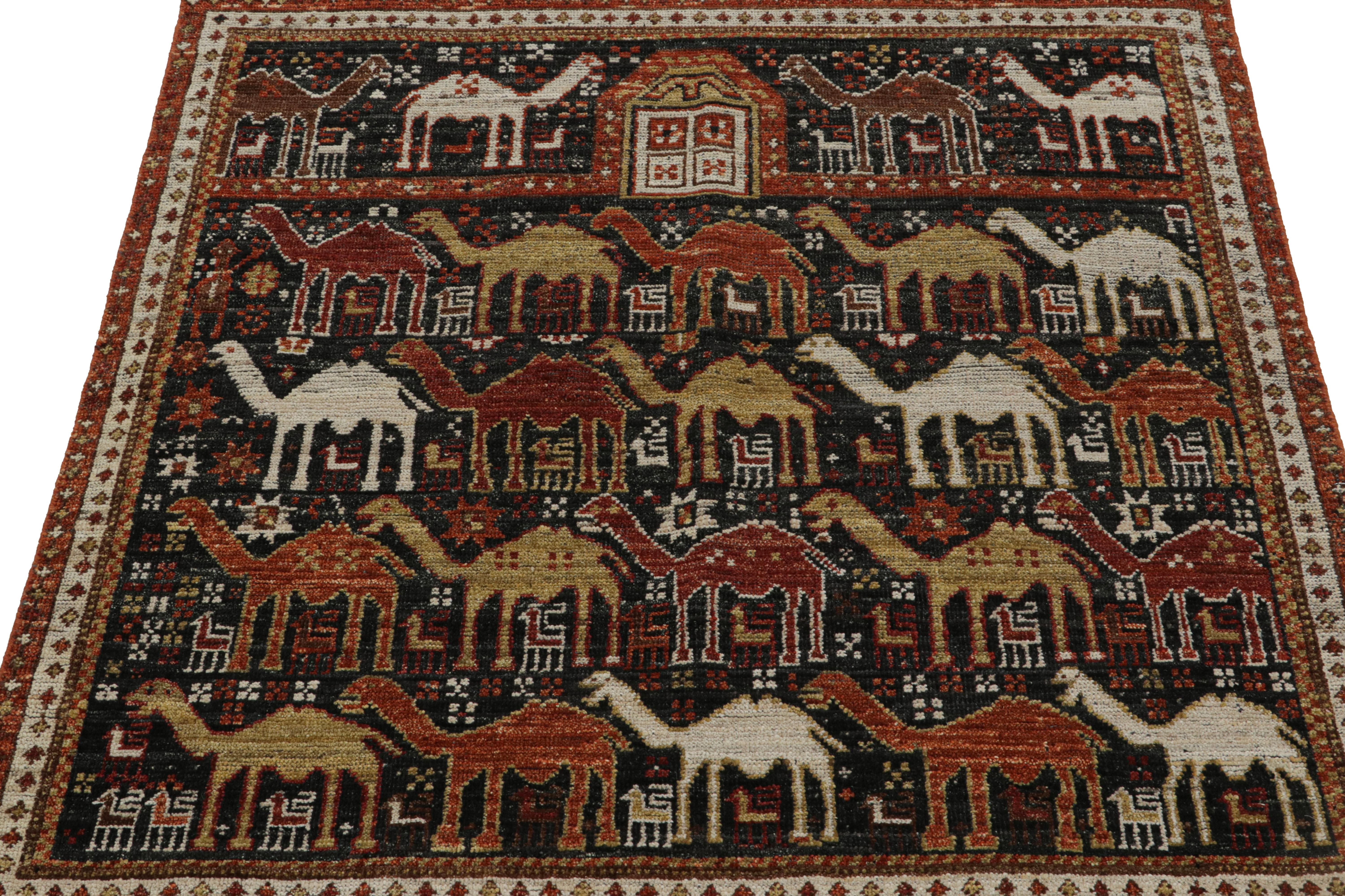 Indien Rug & Kilim’s Tribal Style Rug in Black with Red, Gold-Brown Pictorial Patterns en vente