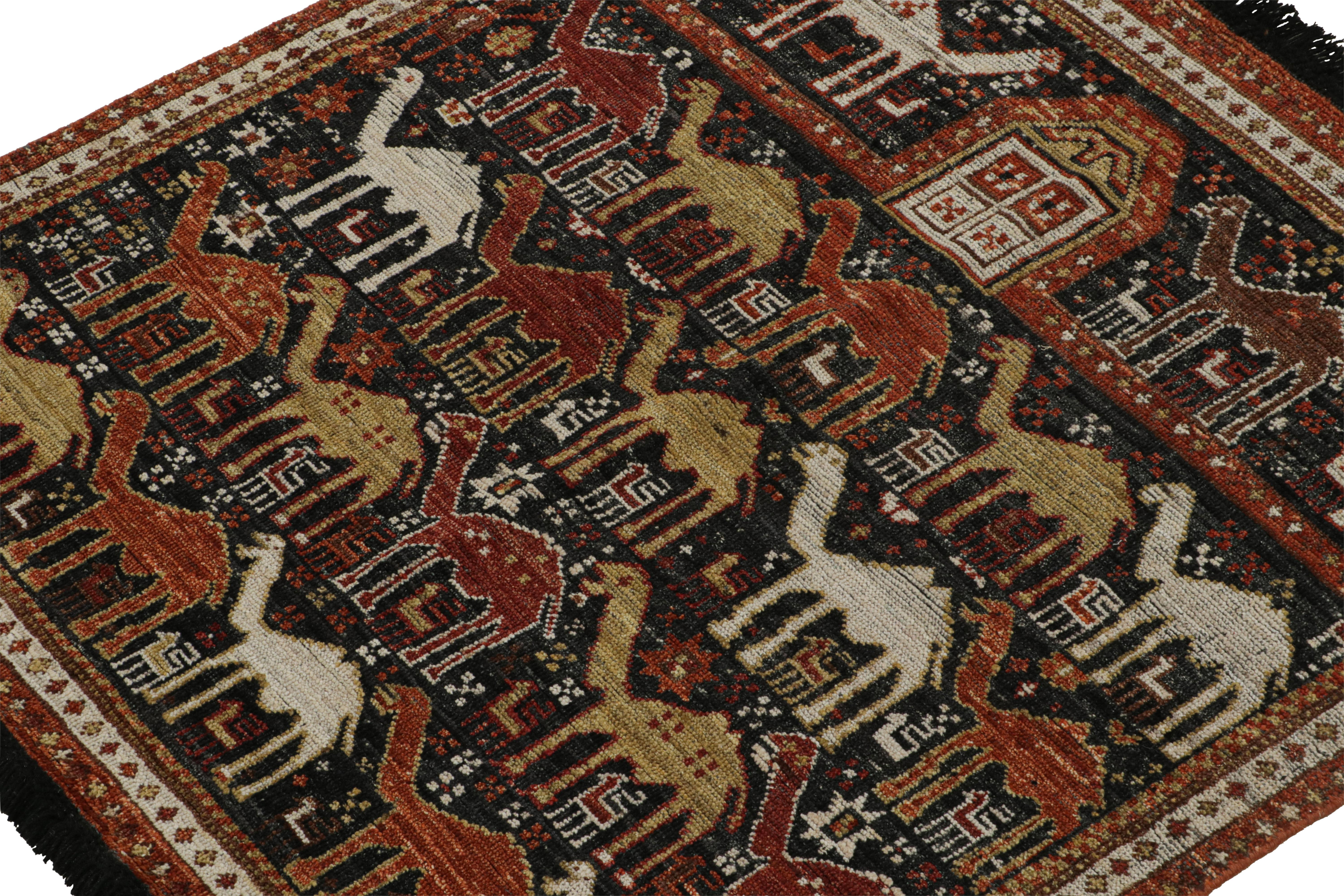 Noué à la main Rug & Kilim’s Tribal Style Rug in Black with Red, Gold-Brown Pictorial Patterns en vente