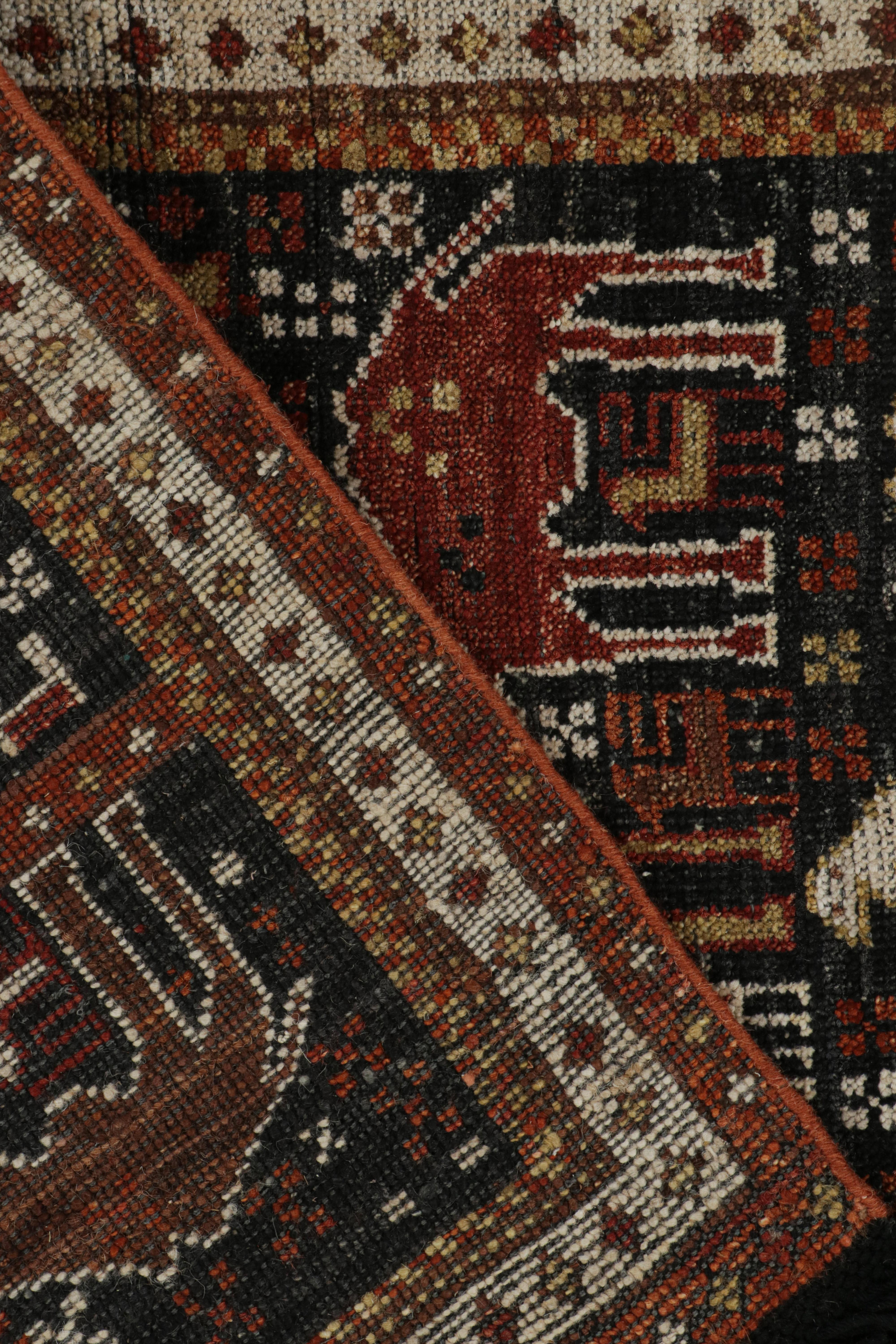 Wool Rug & Kilim’s Tribal Style Rug in Black with Red, Gold-Brown Pictorial Patterns For Sale
