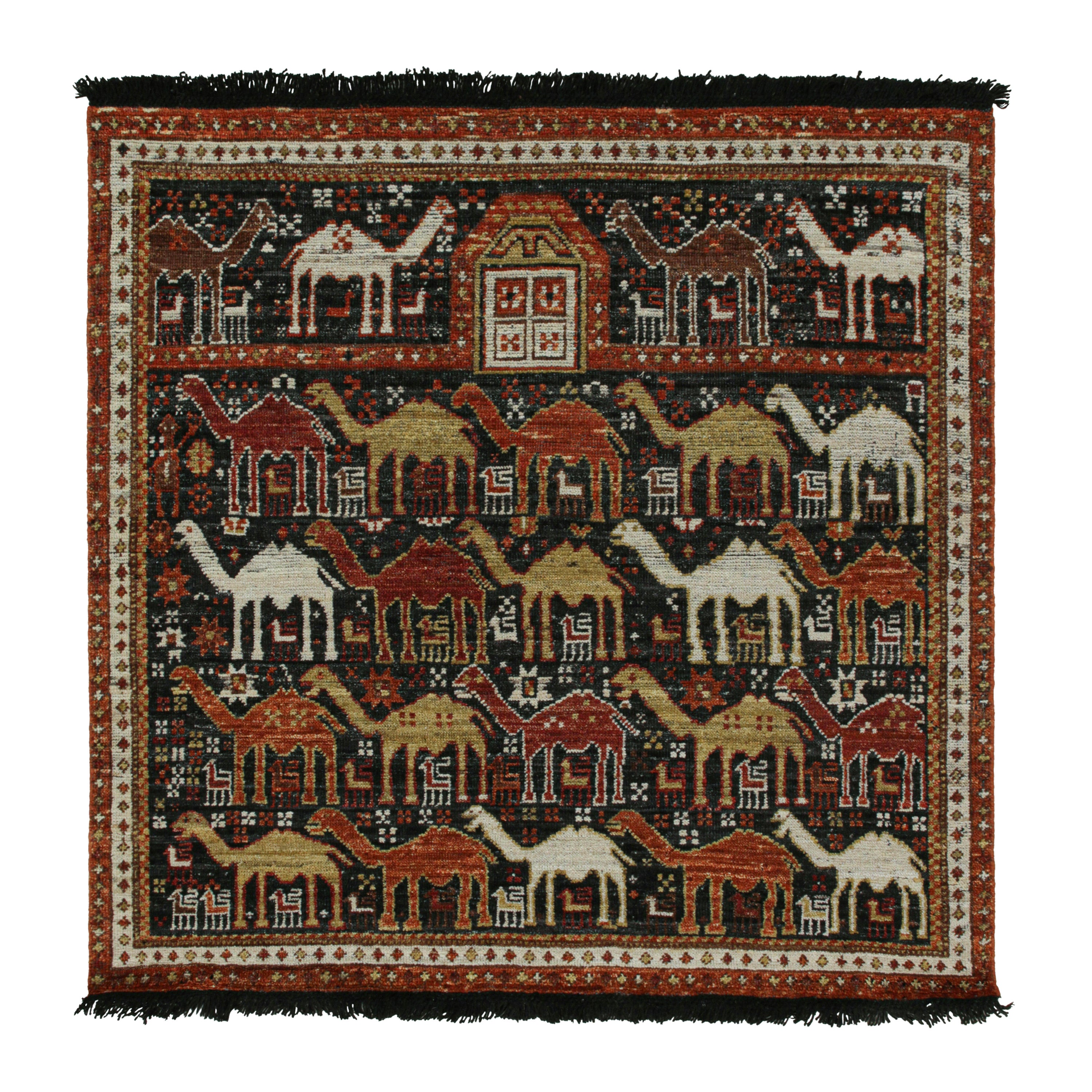 Rug & Kilim è un tappeto in stile tribale in nero con motivi pittorici rossi, oro e marrone.