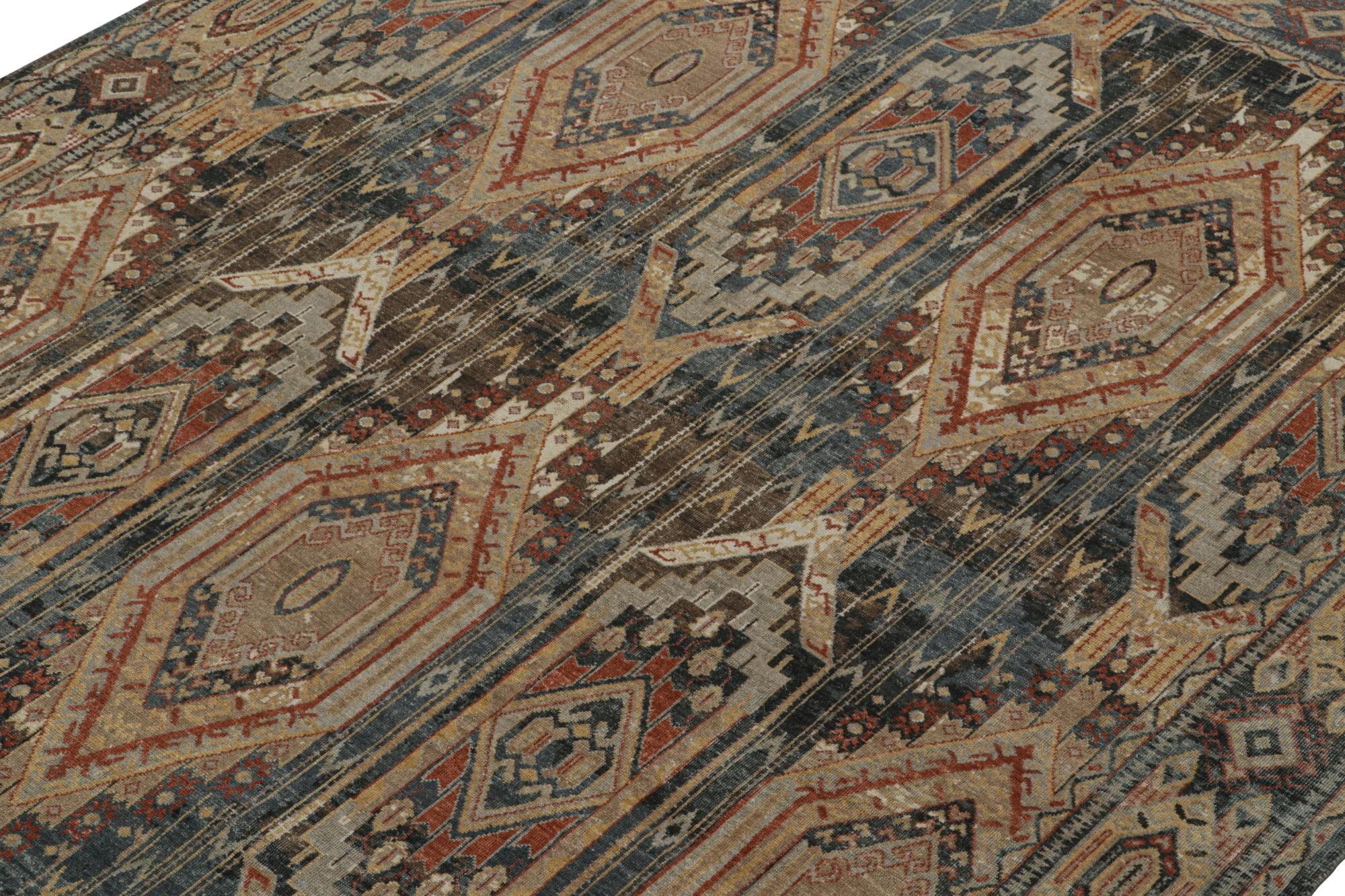 This 8x10 rug is a new addition to the Homage Collection by Rug & Kilim.

Further On the Design: 

Hand knotted in wool, this piece enjoys an elaborate geometric pattern in forgiving blue, brown, red & gold. Keen eyes will note that the