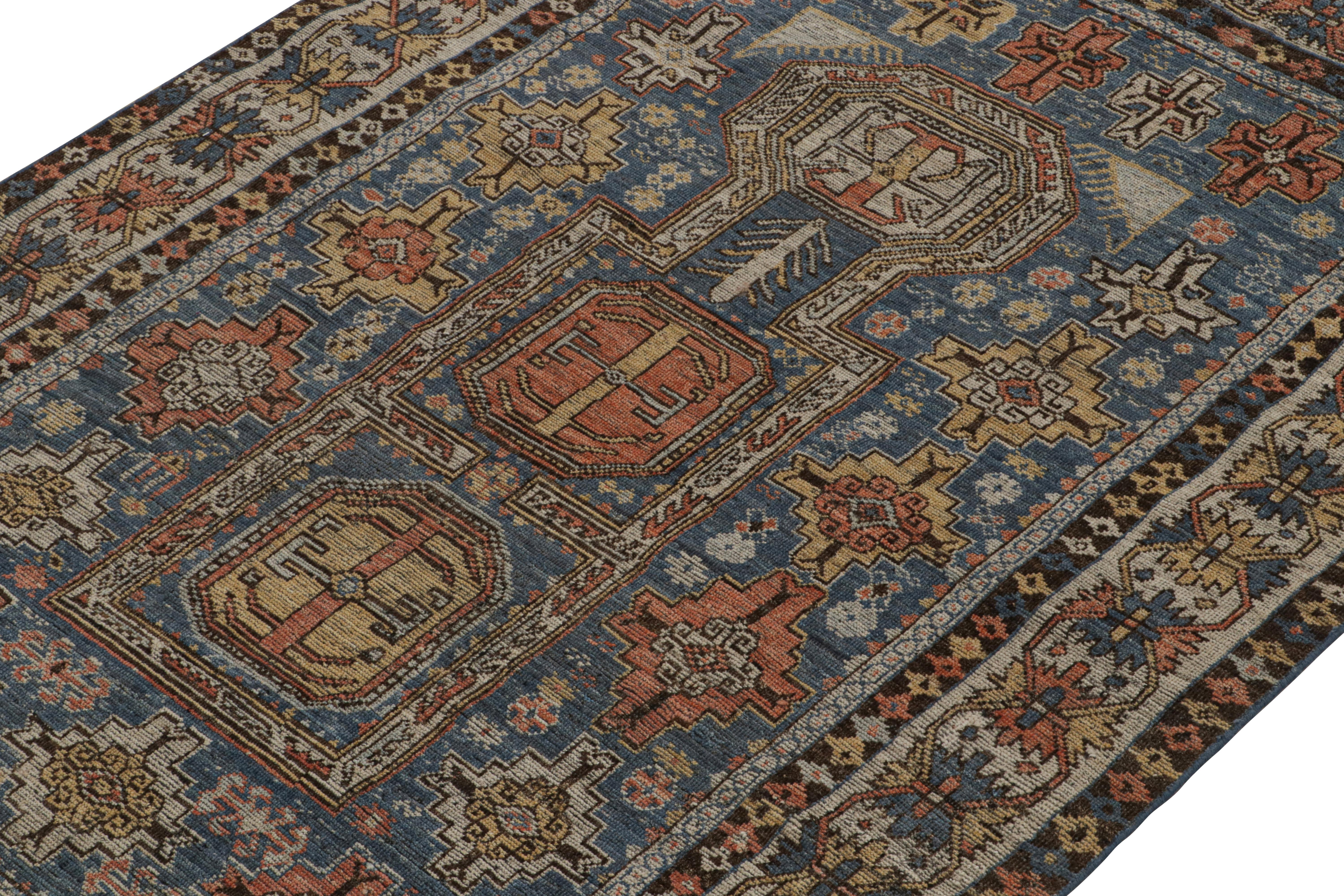 Noué à la main Rug & Kilim's Tribal Style Rug in Blue, with Red and Gold Geometric Patterns (tapis de style tribal en bleu, avec des motifs géométriques rouges et dorés) en vente