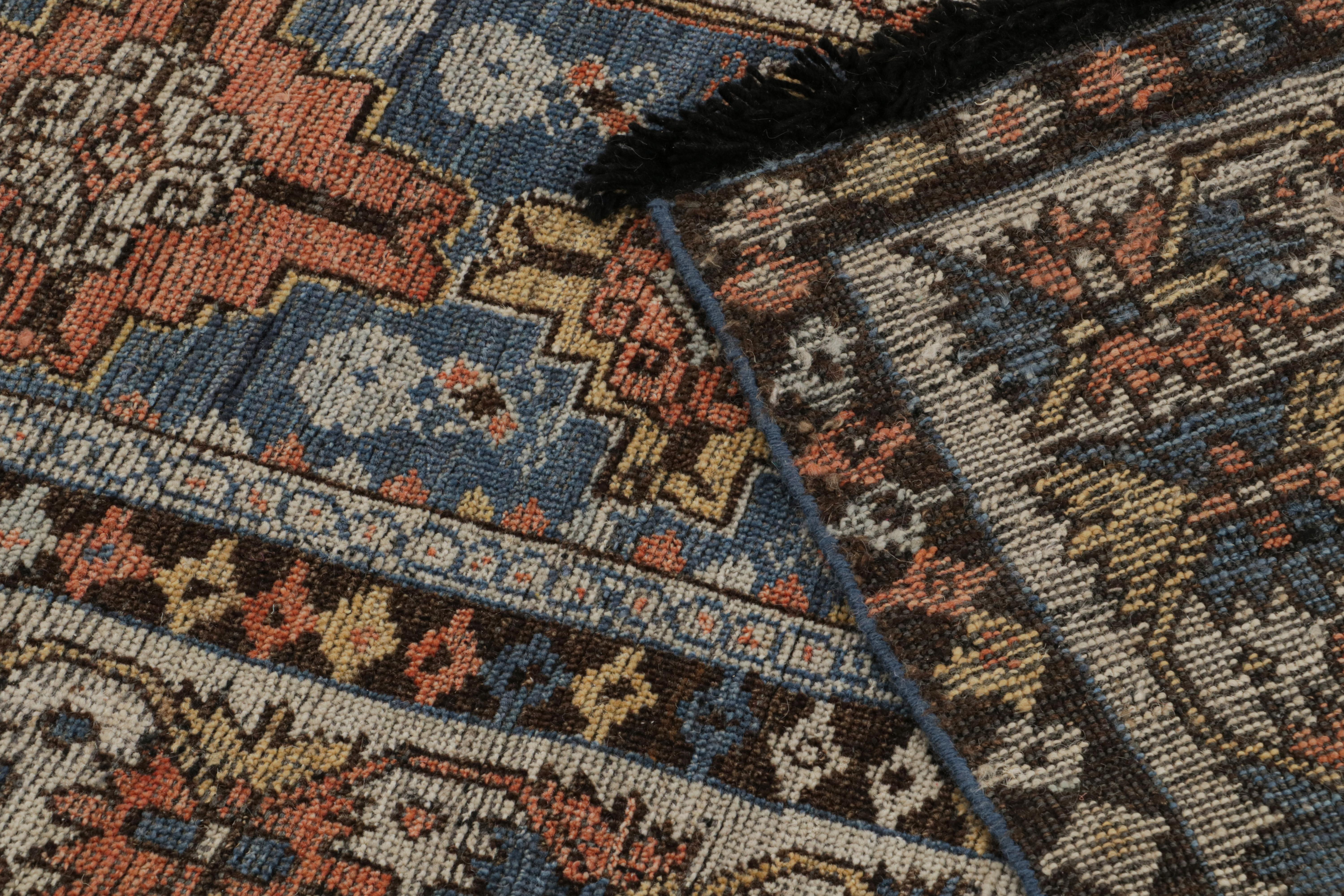 Laine Rug & Kilim's Tribal Style Rug in Blue, with Red and Gold Geometric Patterns (tapis de style tribal en bleu, avec des motifs géométriques rouges et dorés) en vente