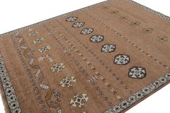 Rug & Kilim’s Tribal Style Rug in Brown with Primitivist Geometric Patterns