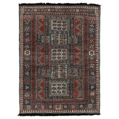Tapis de style tribal de Rug & Kilim à motifs géométriques rouges, bleus et noirs