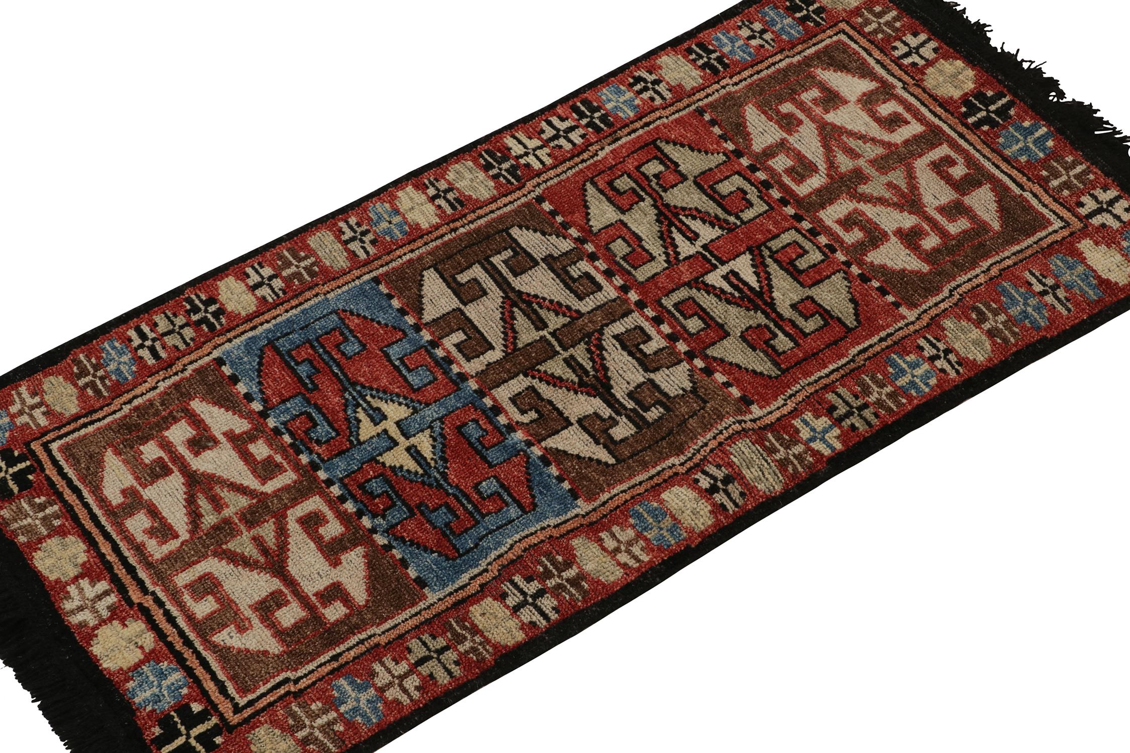 Connoting a contemporary take on nomadic tribal sensibilities, this 2x4 rug from Rug & Kilim’s Burano Collection. 

The design enjoys bold geometric motifs in red, chocolate brown, and blue with a natural gravity in this gift size. Hand-knotted in