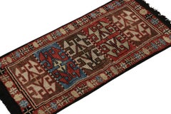 Rug & Kilim's Tribal-Teppich mit geometrischem Muster in Rot, Brown und Blau