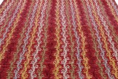 Rug & Kilim’s Tribal Style Rug in Red with Colorful Geometric Stripes