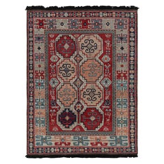 Rug & Kilim's Tribal Style Teppich in Rot mit rosa und blauen geometrischen Medaillons