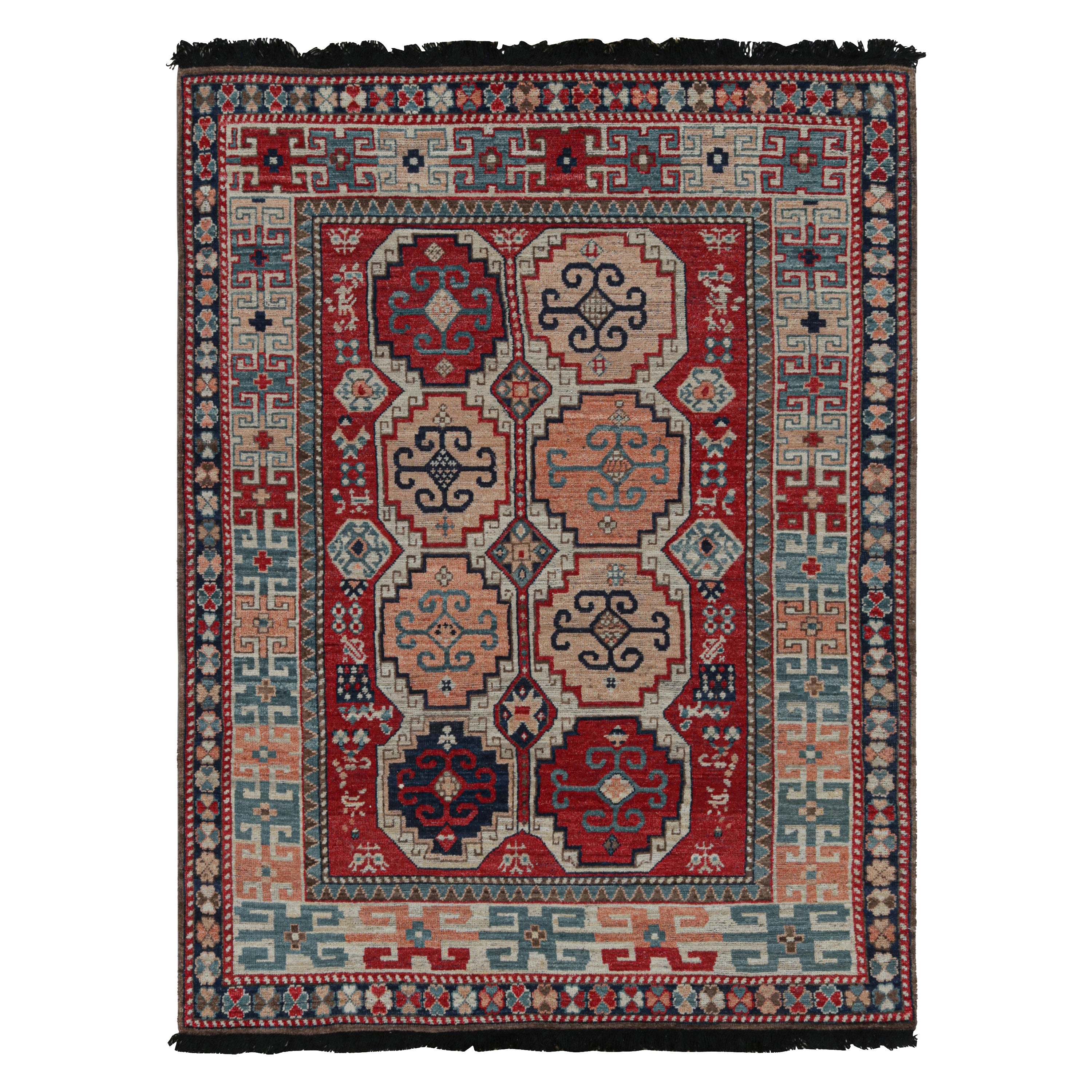 Tappeto in stile tribale Rug
Kilim in rosso con medaglioni geometrici rosa e blu