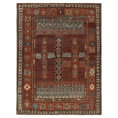 Rug & Kilim’s Tribal Style Rug in Rich Red, with Colorful Geometric Patterns