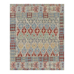 Rug & Kilim's Tribal Style Teppich mit lebhaften polychromatischen geometrischen Mustern