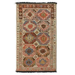 Runner in stile tribale di Rug & Kilim in beige con medaglioni blu e rossi