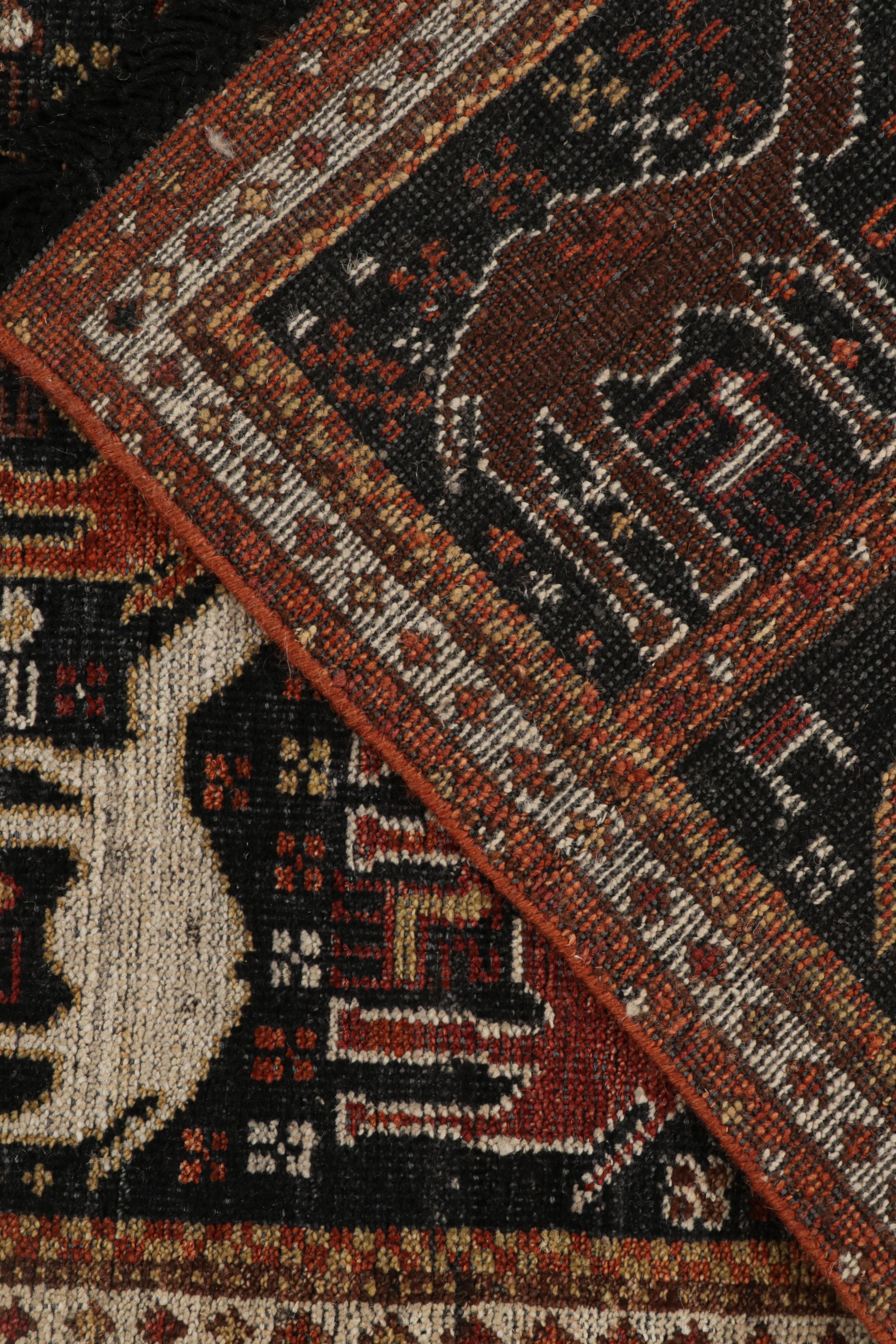 Wool Rug & Kilim’s Tribal style runner in Black with Red, Gold-Brown Pictorials For Sale
