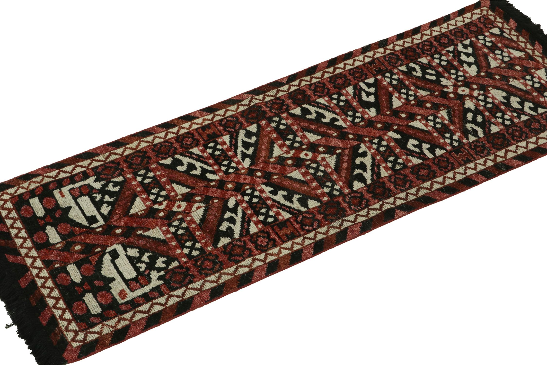 Connoting a contemporary take on nomadic tribal sensibilities, this 2x6 runner from Rug & Kilim’s Burano Collection showcases bold geometric patterns in deep red, chocolate brown, white & black for exceptional movement in this scale. Connoisseurs