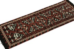Rug & Kilim’s Tribal style runner in red, black and white geometric pattern