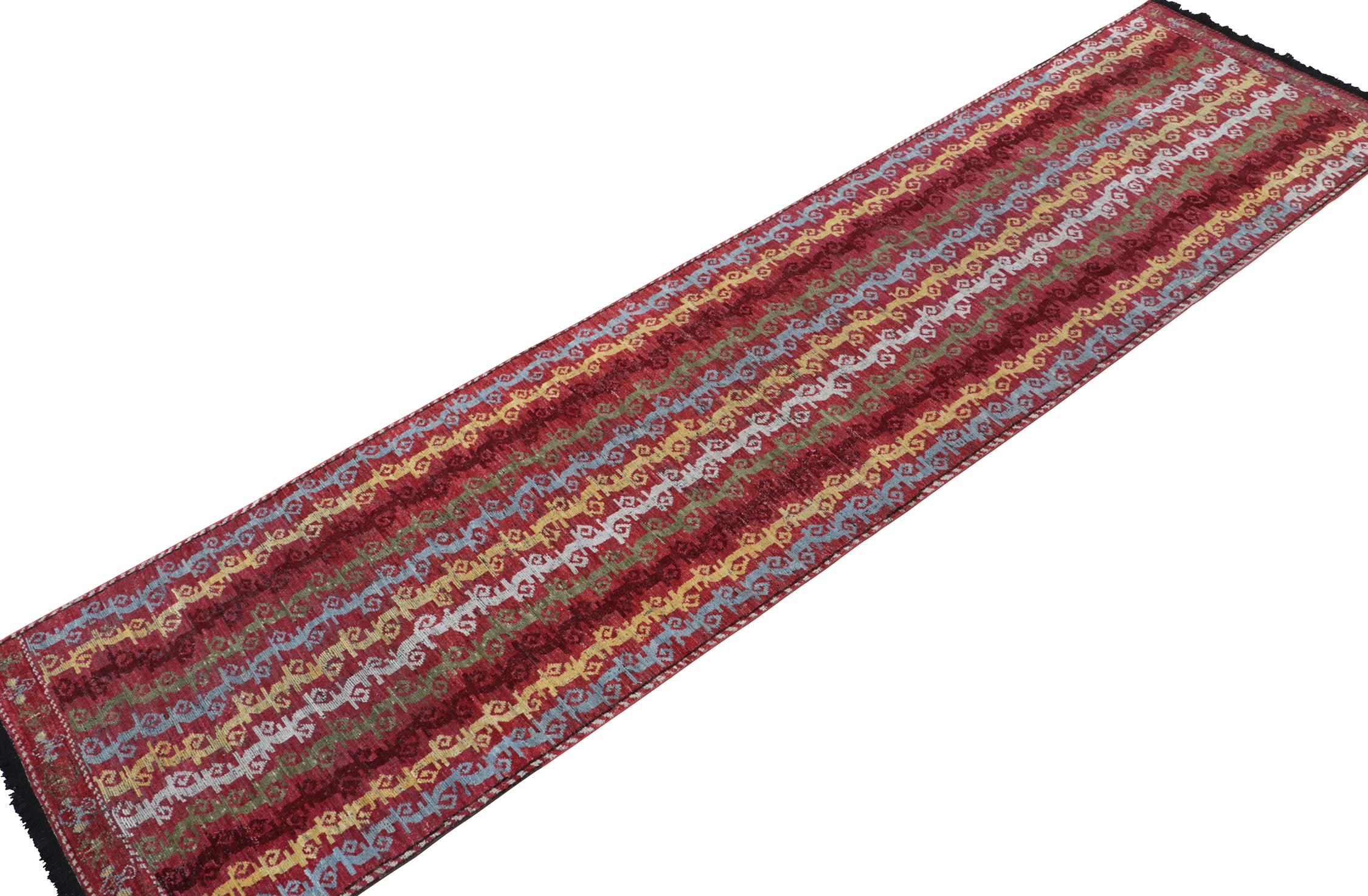 This 3x14 runner is a grand new entry to Rug & Kilim’s custom classics Burano collection. Hand-knotted in Persian wool.
Further on the Design: 
This piece draws on tribal rug patterns, and revels in rich red with vibrant stripes of playful, yet