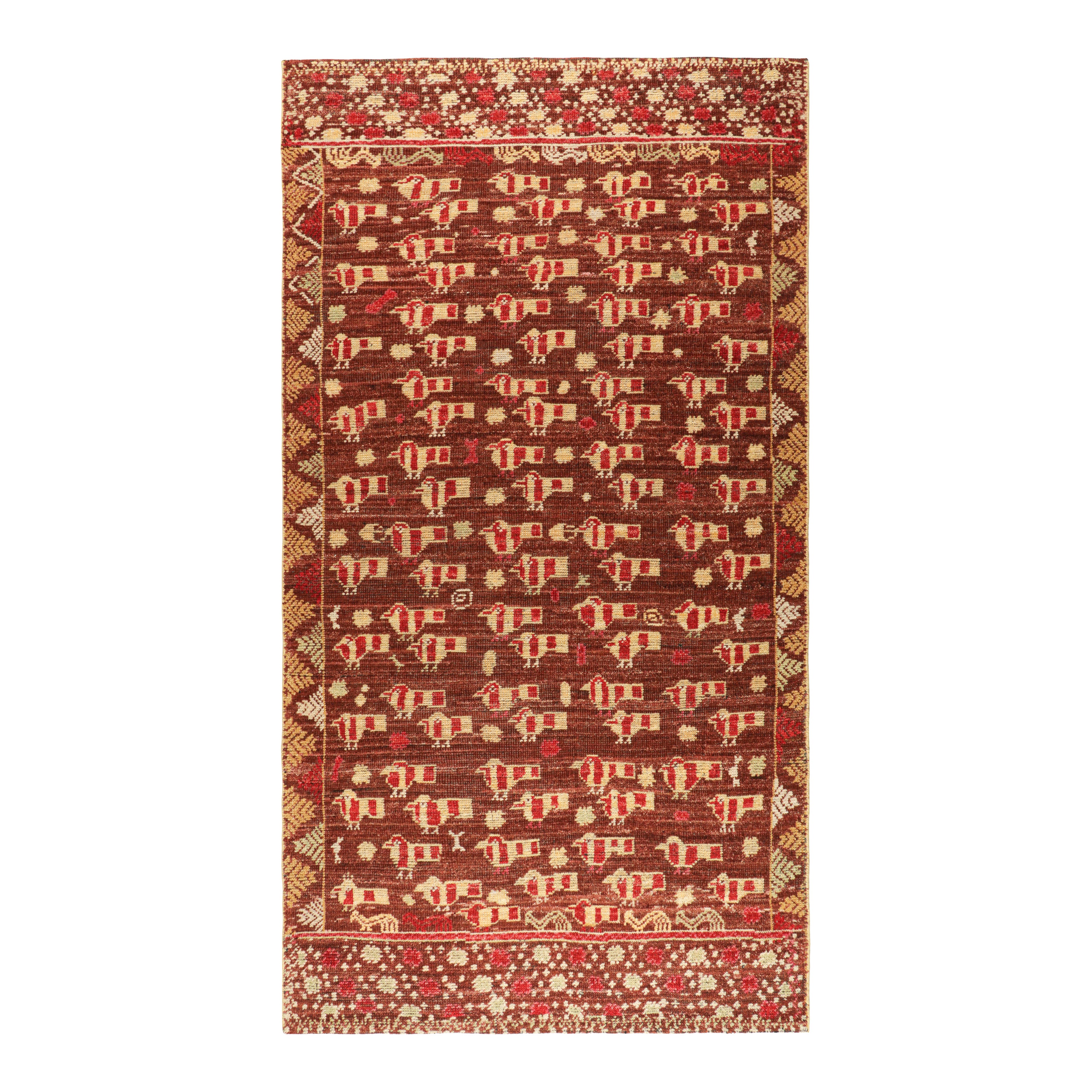 Rug & Kilim è un tappeto runner in stile tribale di colore marrone con motivi geometrici e uccelli.
