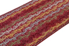 Rug & Kilim’s Tribal Style Runner Rug in Red with Colorful Geometric Stripes