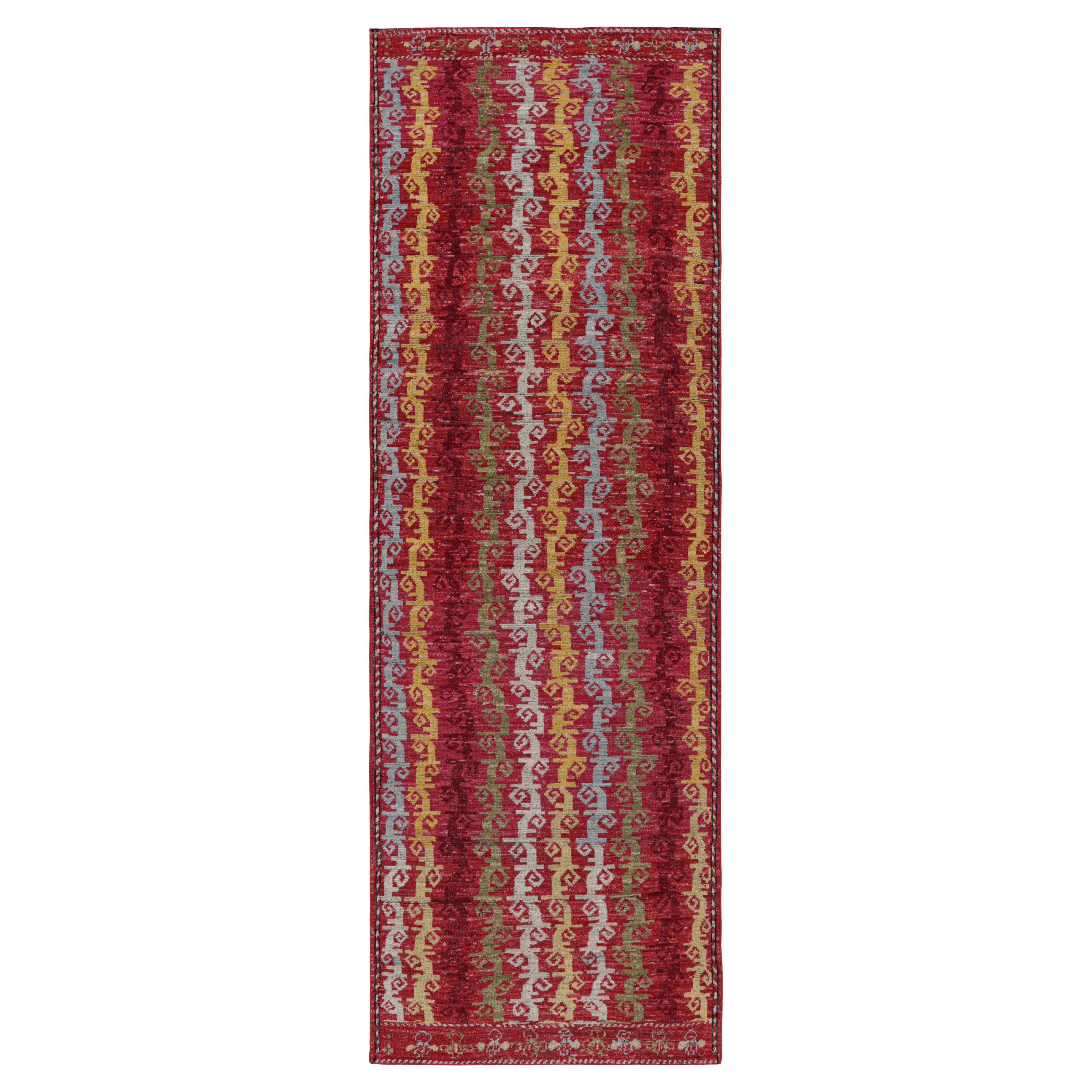 Rug & Kilim’s Tribal Style Runner Rug in Red with Colorful Geometric Stripes