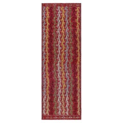 Tapis de course de style tribal rouge à rayures géométriques colorées de Rug
Kilim