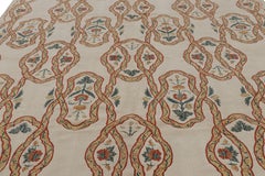Rug & Kilim’s Tudor Style Rug in Beige-Cream with Geometric and Floral Patterns