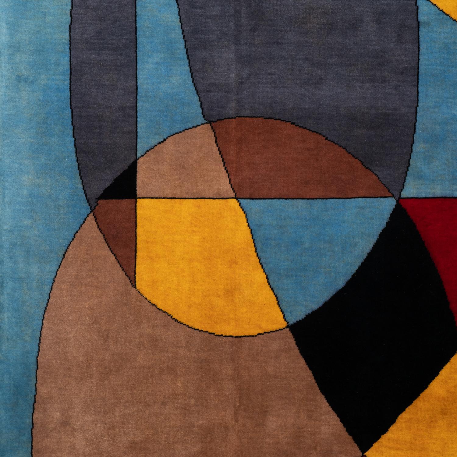 Rug, or tapestry, inspired by Robert Delaunay, abstract and geometric, in red, yellow and black on a blue background. Hand-knotted in Merino wool.

Contemporary craftsmanship.

Numbered 1/8. Area: 5 6 square meters. Density: 784 000 knots.

Comes