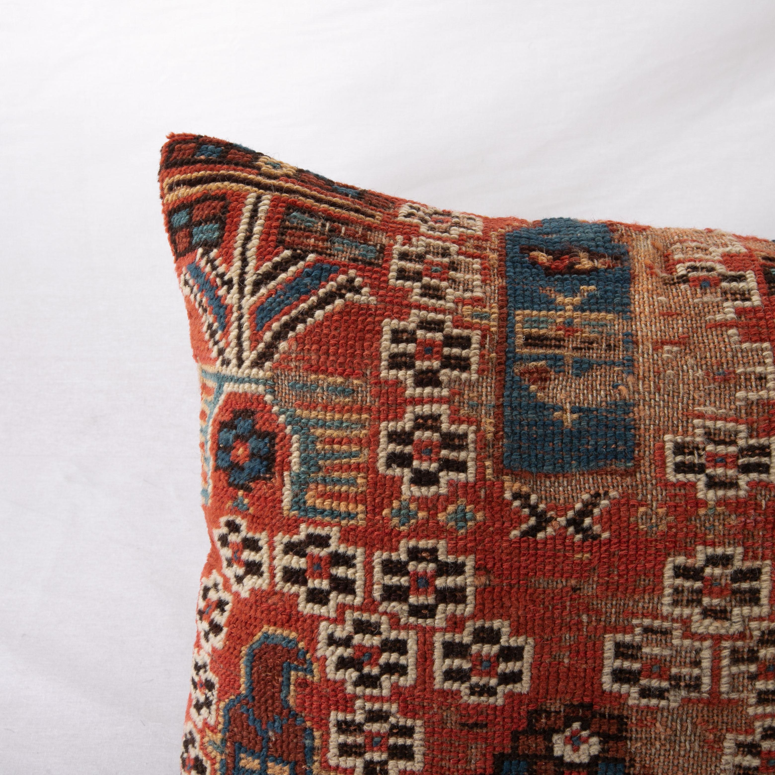 Tribal Rug Pillow Cover Made from a Caucasian Shirvan Rug, Early 20th C. For Sale