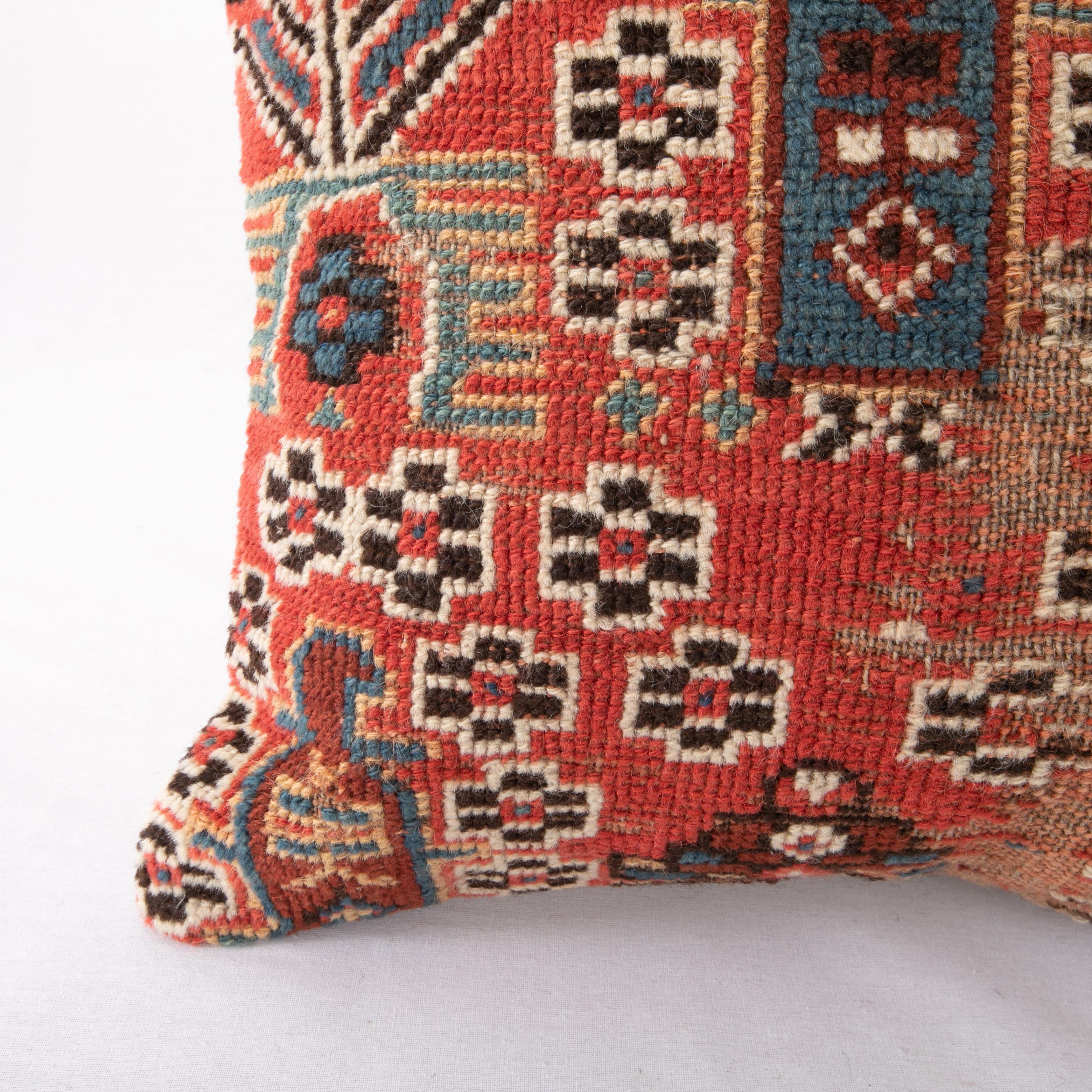 Tribal Rug Pillow Cover Made from a Caucasian Shirvan Rug, Early 20th C For Sale