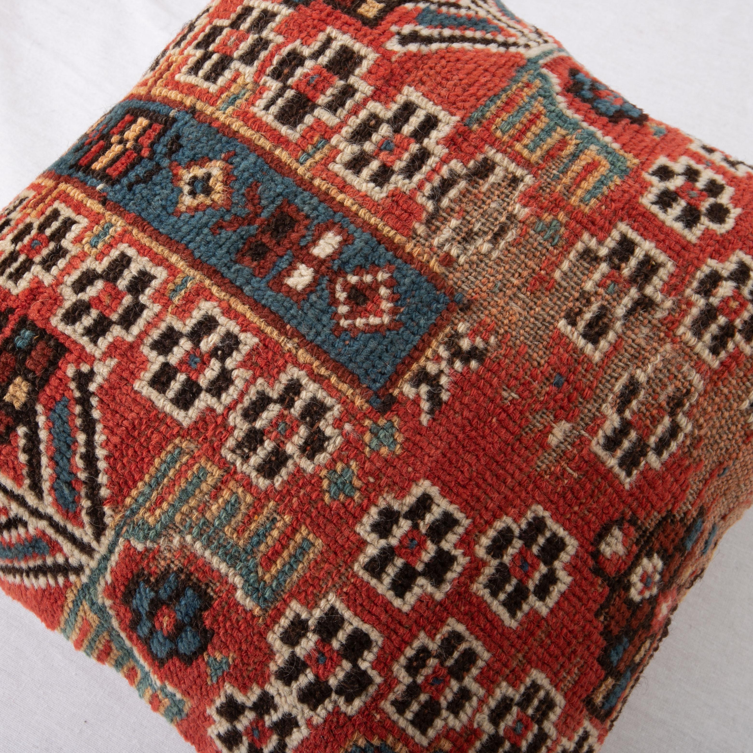 Rug Pillow Cover Made from a Caucasian Shirvan Rug, Early 20th C In Distressed Condition For Sale In Istanbul, TR