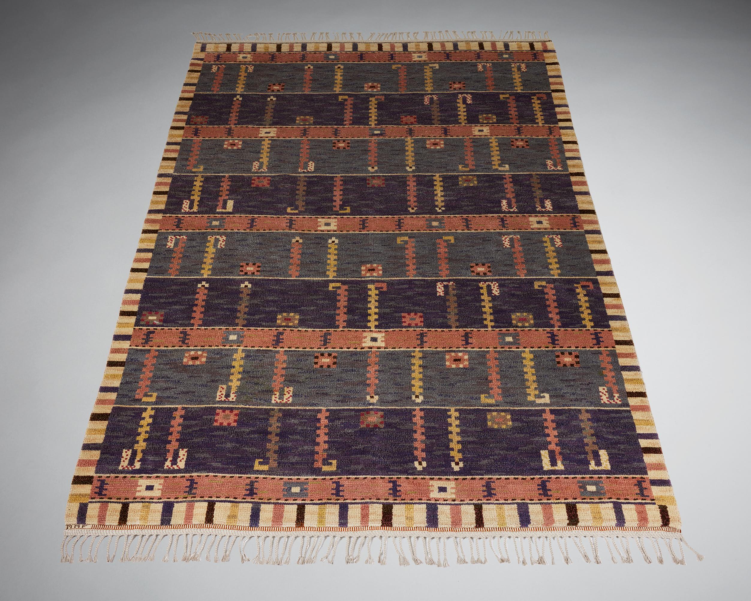 Rug ‘Ståndaren’ designed by Märta Måås-Fjetterström for MMF,
Sweden, 1928.

Wool.

Signed.

This example was woven before 1942. The pattern 