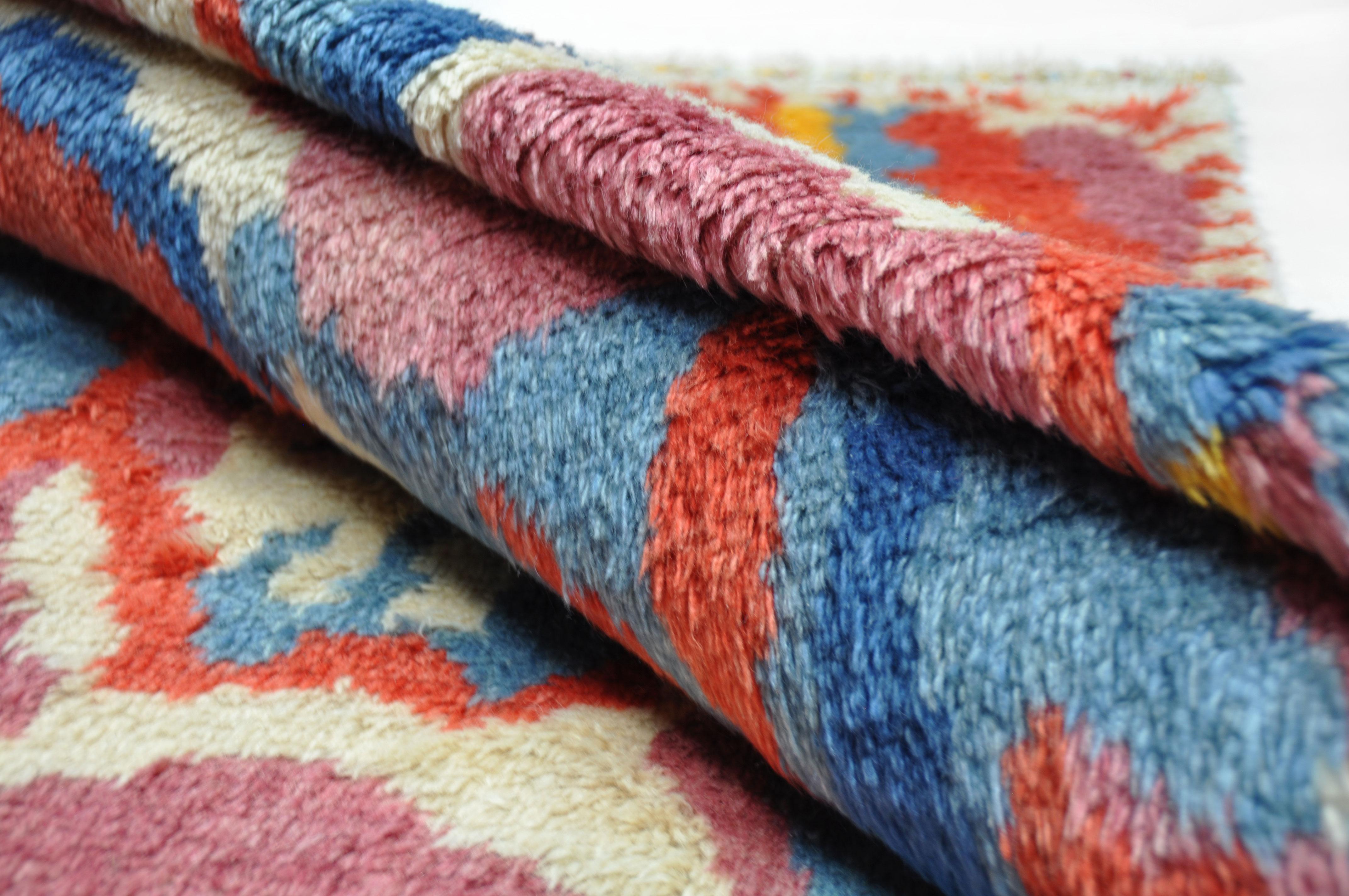 Rug wool hand knotted Meram with red blue and yellow.
