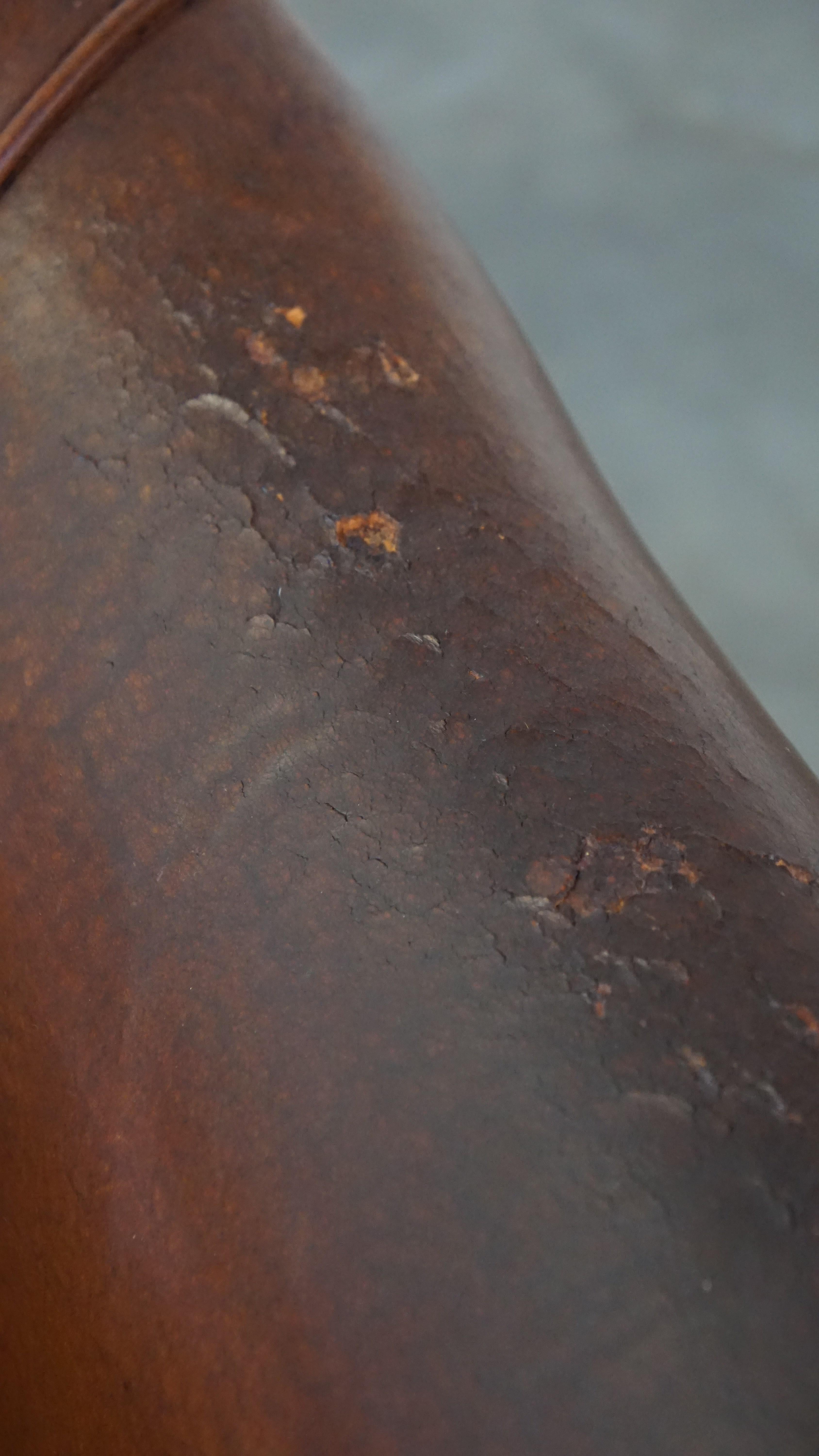 Rugged yet comfortable vintage club chair made of sheepskin For Sale 6