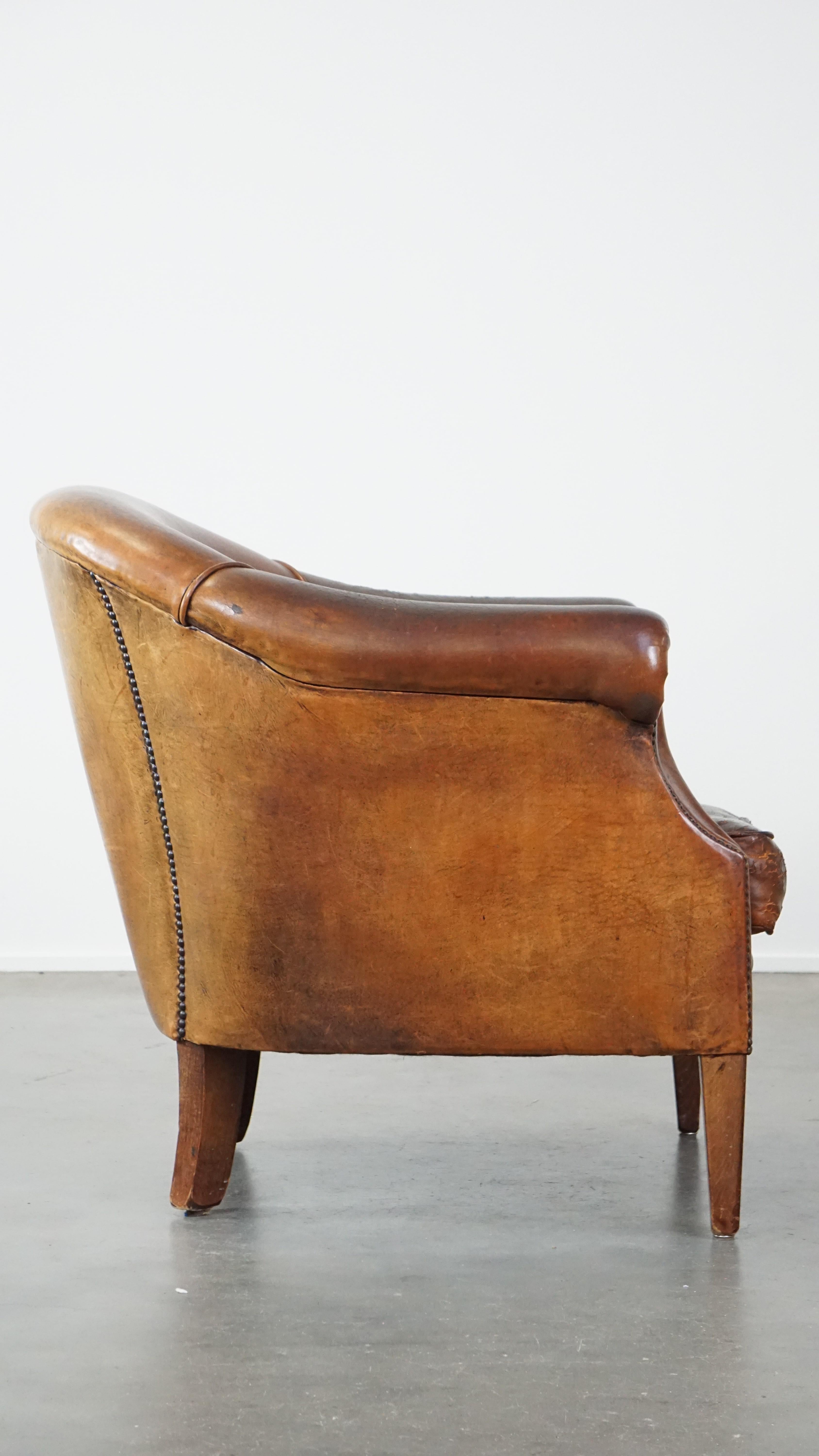 Hand-Crafted Rugged yet comfortable vintage club chair made of sheepskin For Sale