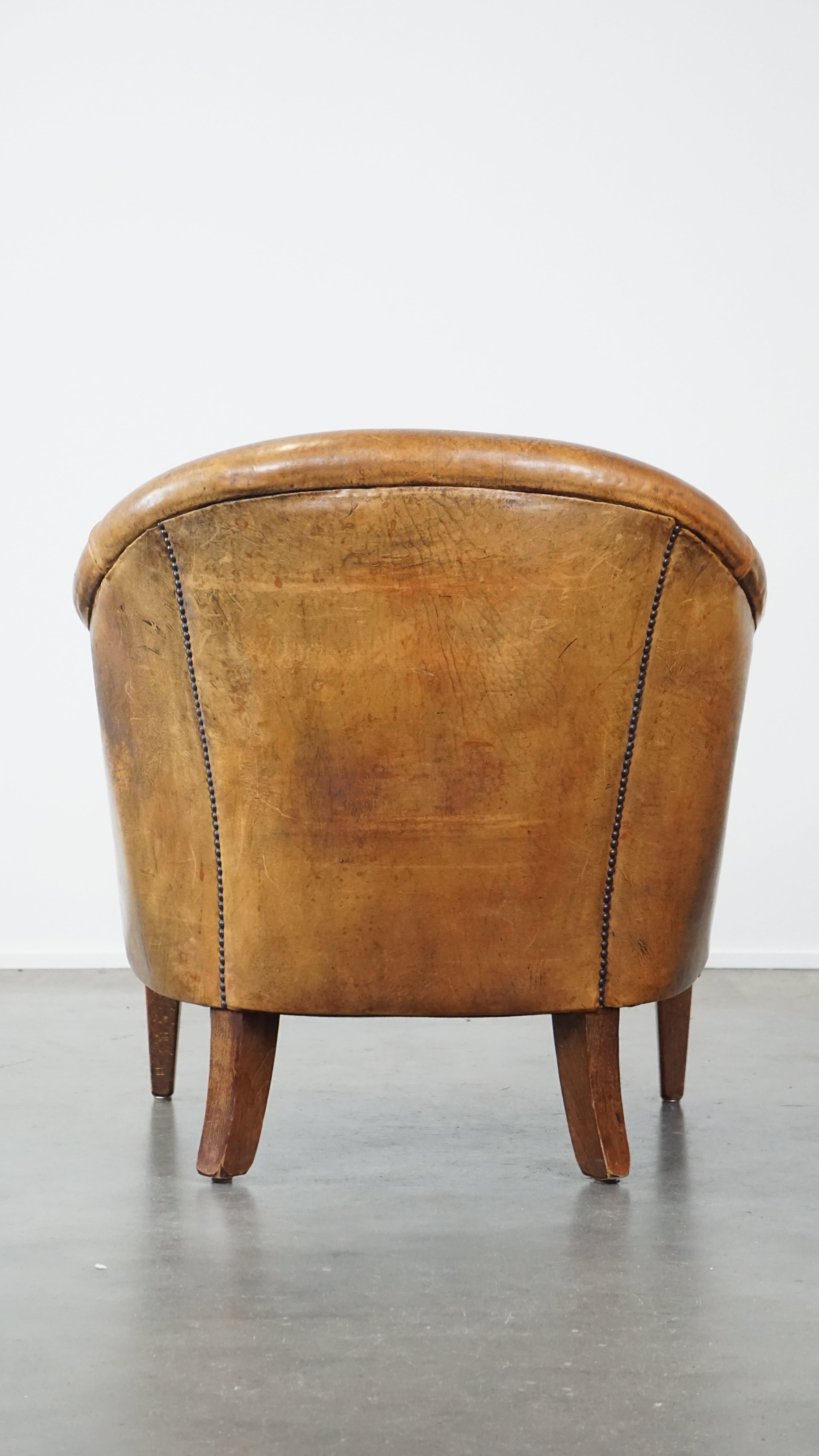 Rugged yet comfortable vintage club chair made of sheepskin In Fair Condition For Sale In Harderwijk, NL