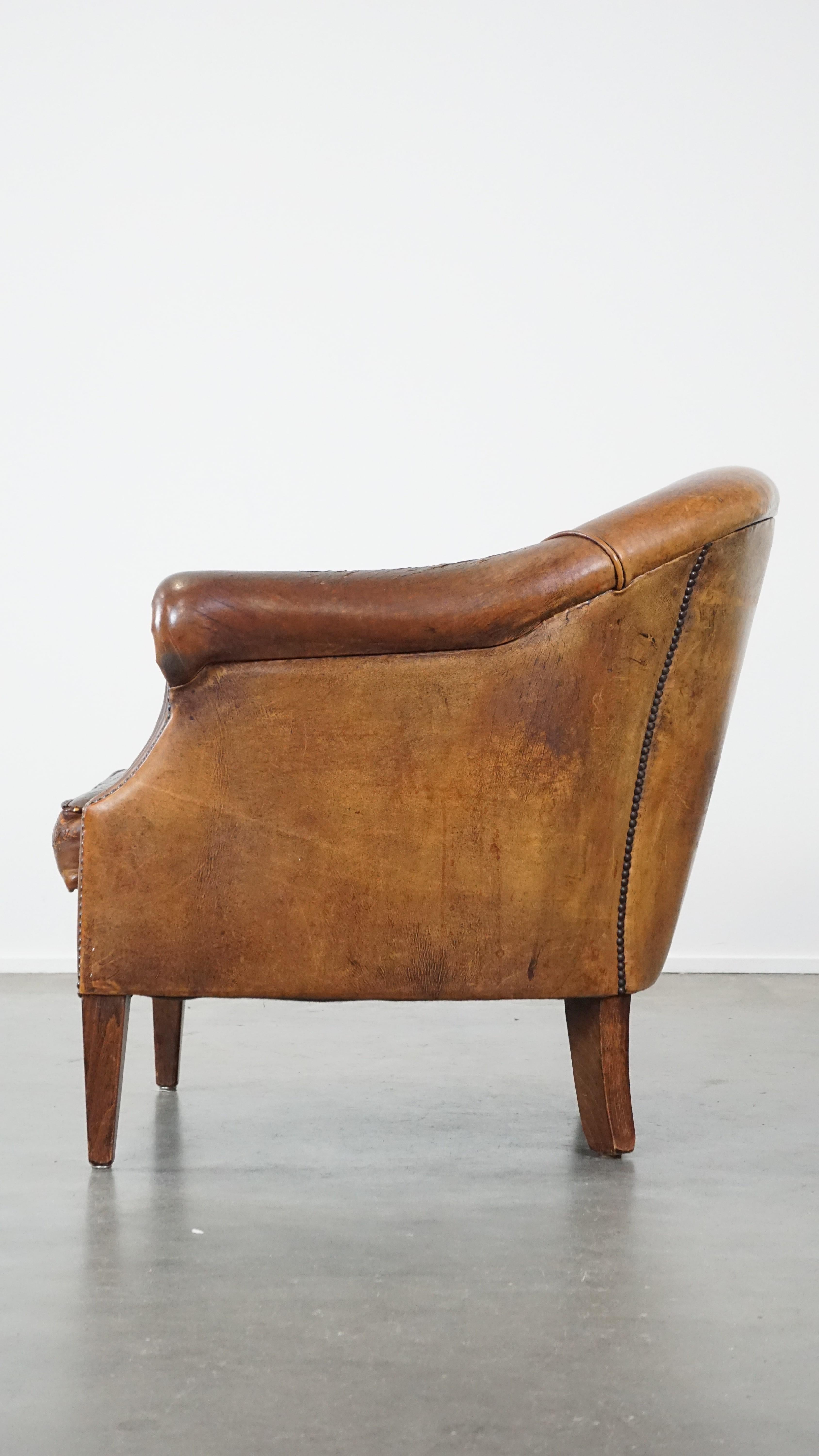 20th Century Rugged yet comfortable vintage club chair made of sheepskin For Sale