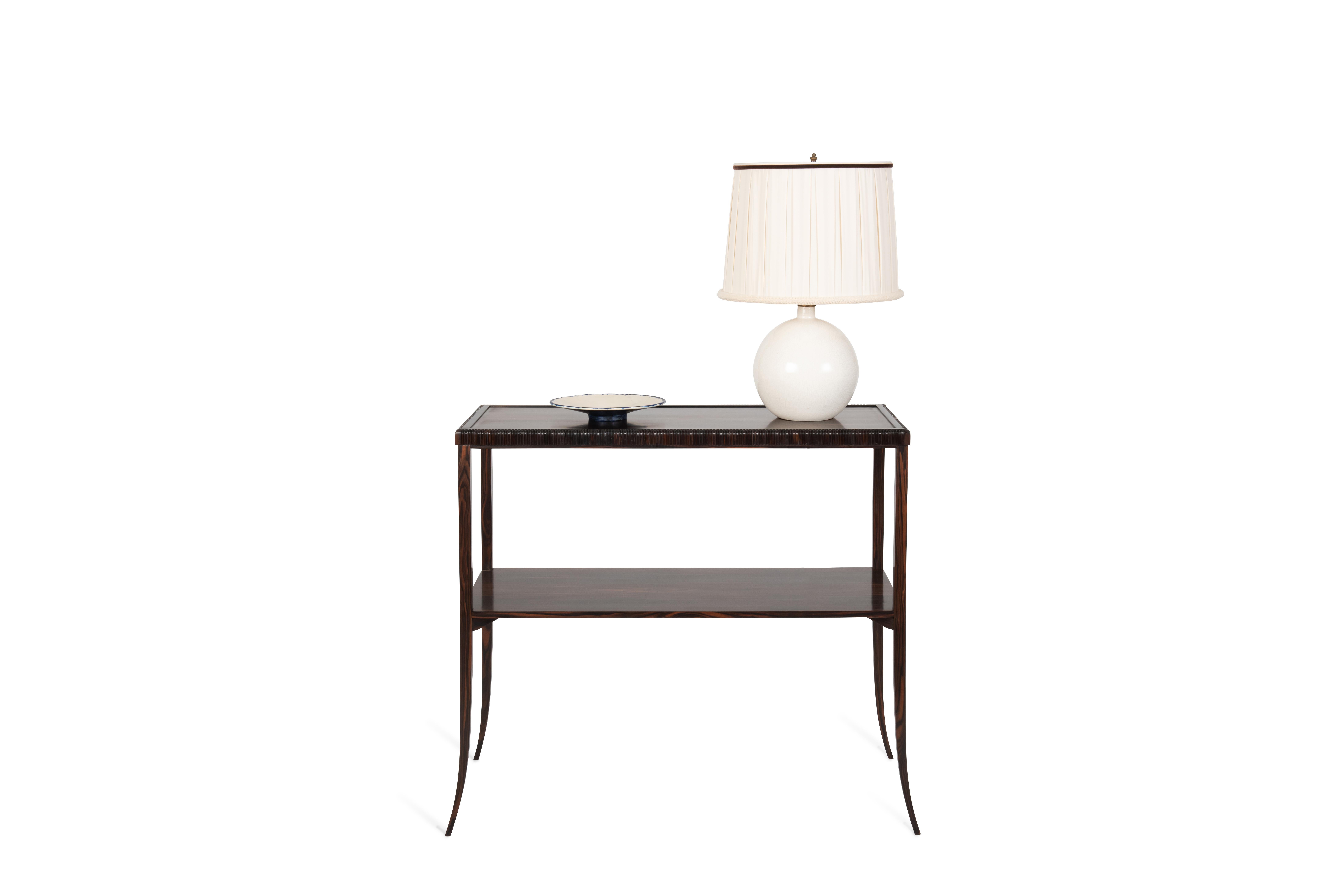 A crackled-glazed off-white ceramic “Boule” table lamp created by Jean Besnard for Émile-Jacques Ruhlmann, circa 1925. The spherical shape of the lamp stand is elegantly complemented by a cylindrical collar edge. The lamp has a new lampshade in the
