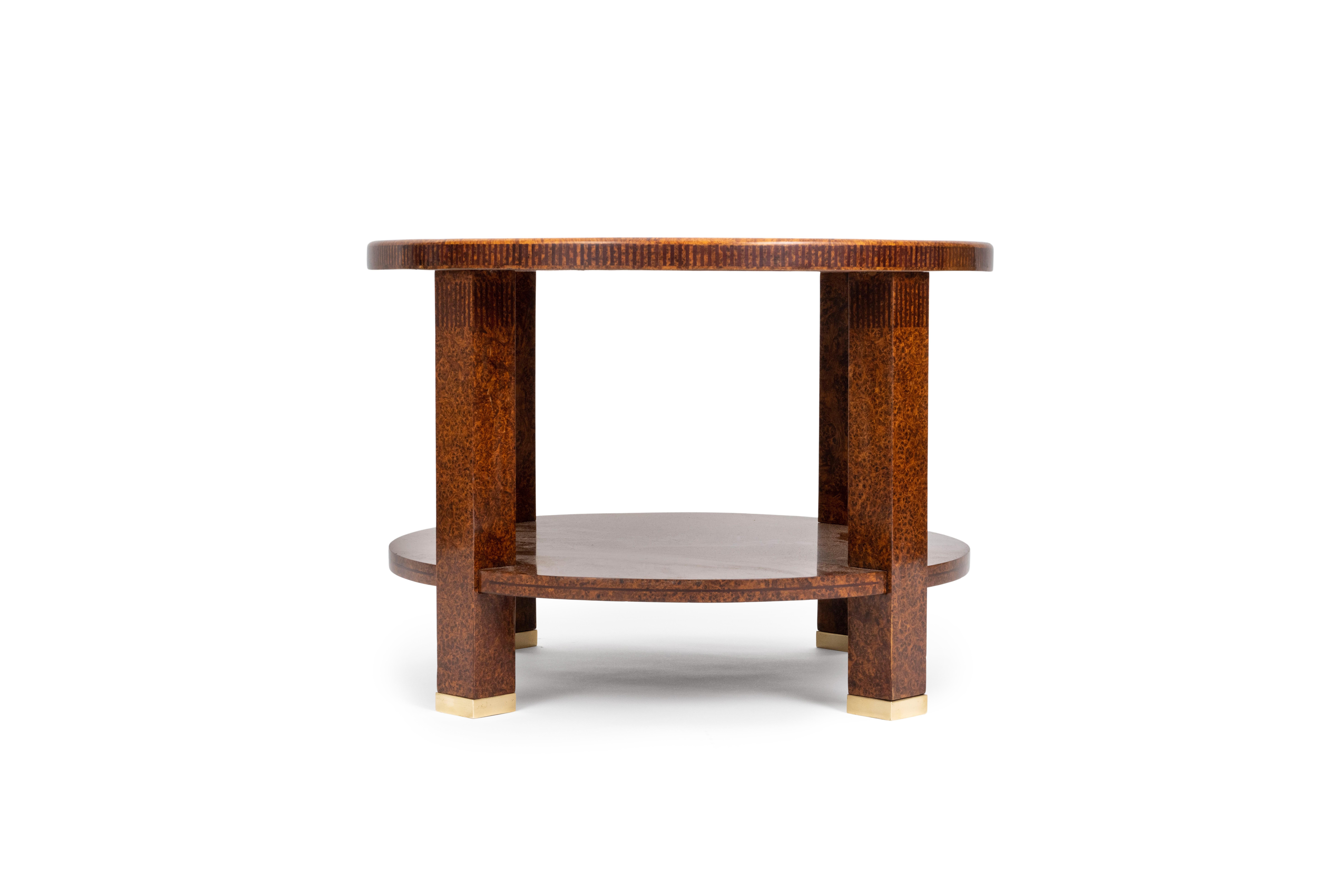  'Guéridon' table, variant of the 'Levard' model in Burr amboyna with bronze 'sabots.' 


Émile-Jacques Ruhlmann (1879-1933) was a French furniture designer and interior decorator and one of the most important and influential figures of the Art Deco