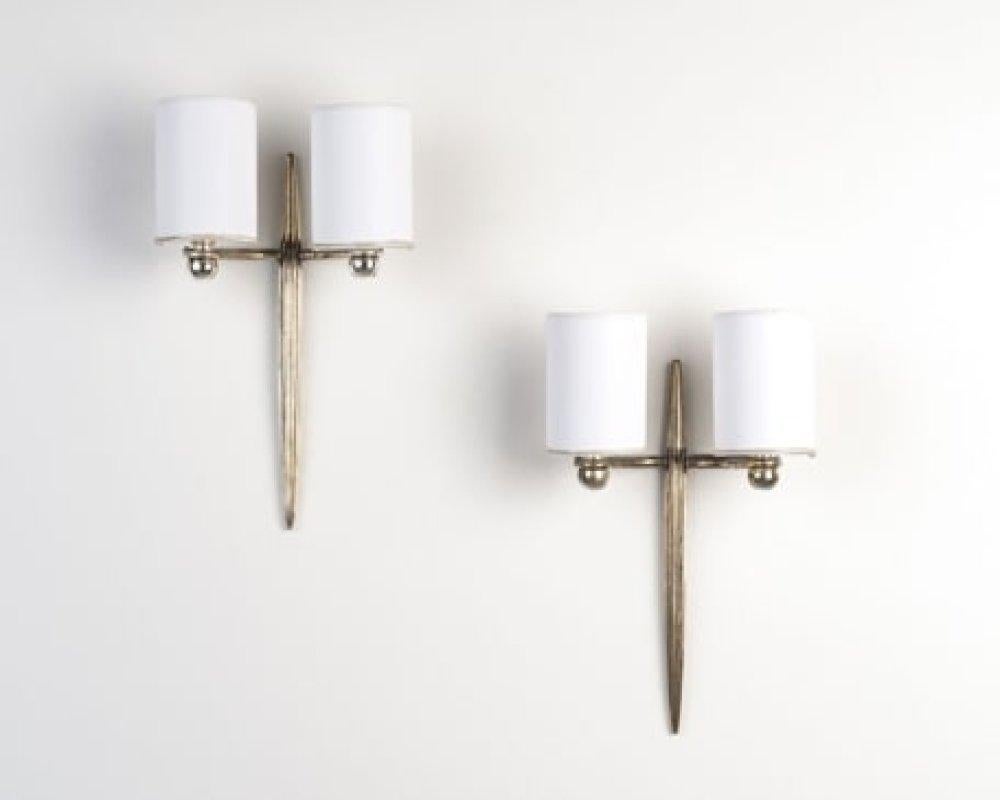 “Fuseau,” a pair of silvered bronze wall sconces with two arms of light. Each sconce is stamped “Ruhlmann.” Recorded under nos. 3009AR and 3665NR in the Ruhlmann archives, Musée des Années 30, Boulogne-Billancourt.

Émile-Jacques Ruhlmann