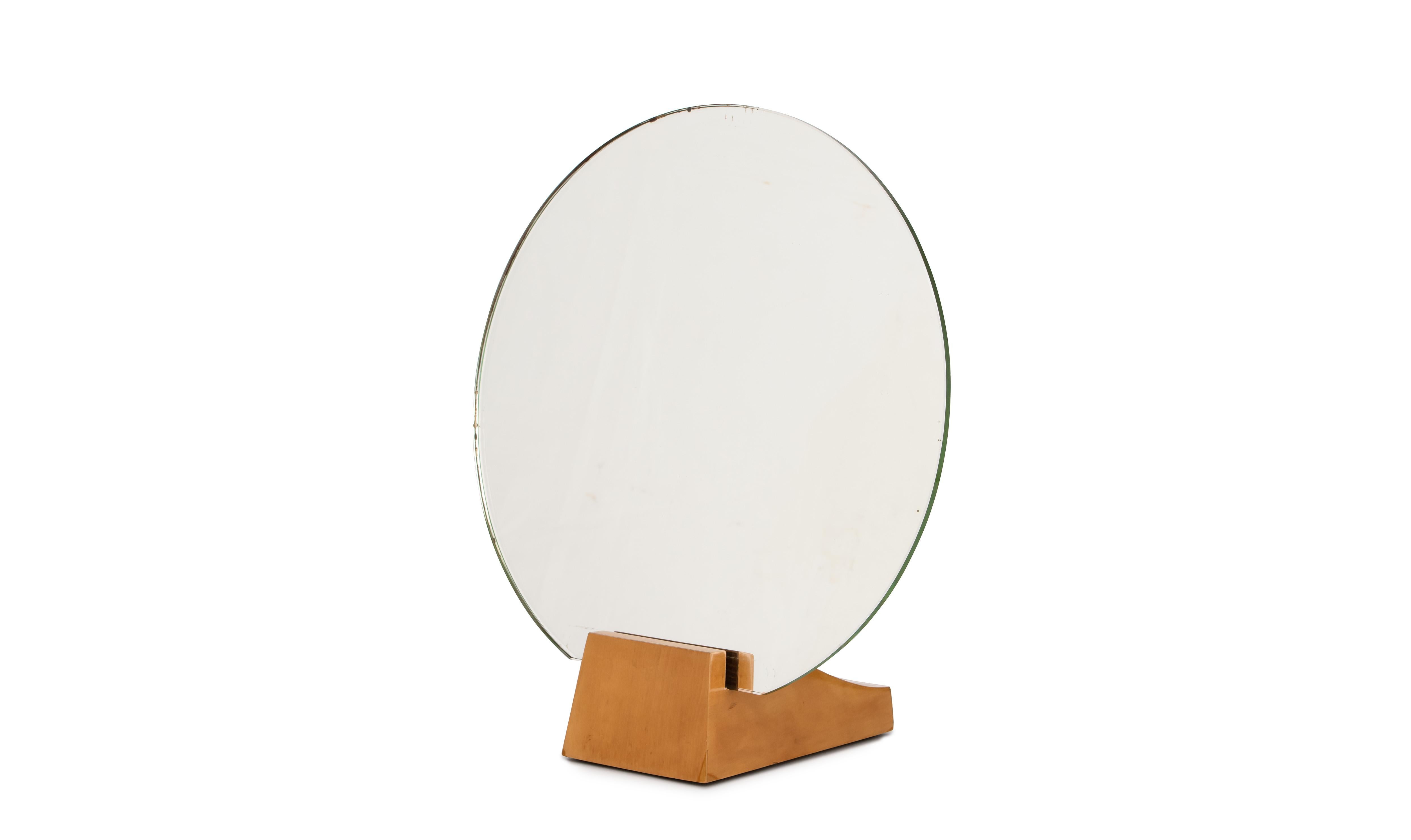 Rare dressing table mirror with trapeze-shaped base in sycamore veneer. Reference number 3816AR and 3767NR in the Ruhlmann Archives, Musée des Années 30, Boulogne Billancourt.

Émile-Jacques Ruhlmann (1879-1933) was a French furniture designer and