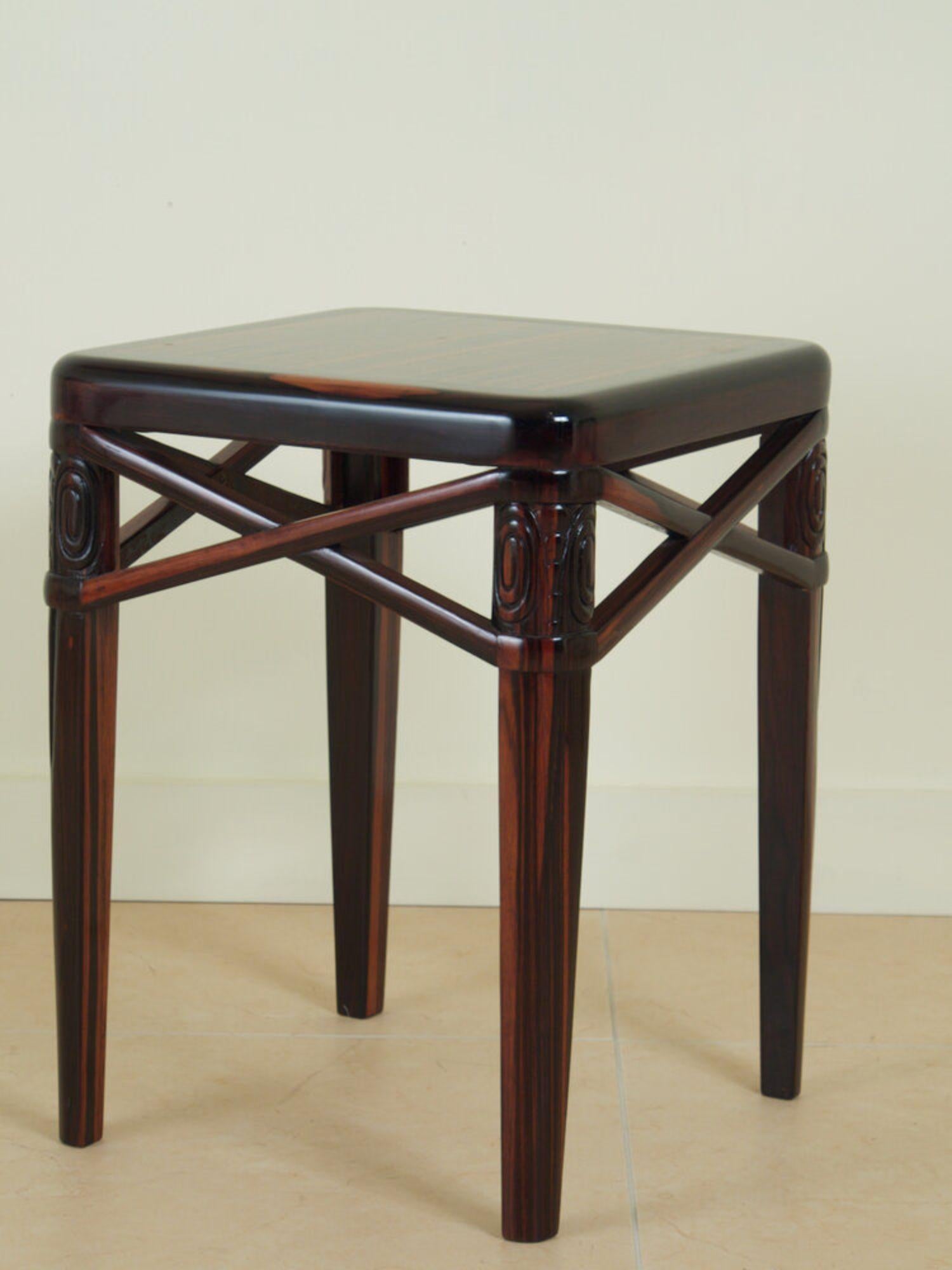 Classic French Art Deco small side table/bench by Ruhlmann, 1925, in solid macassar ebony, with new veneered inset top. This small table was used as a  small bench and istogether with the original inset padded top. 14