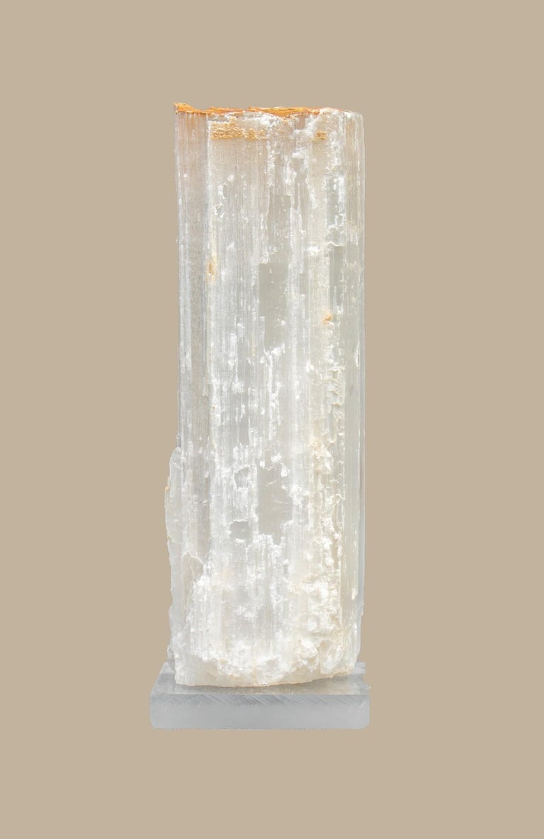 Ruler Selenite with an 18th century Italian gold leaf fragment and natural forming baroque pearls on a lucite base. Ruler selenite or 