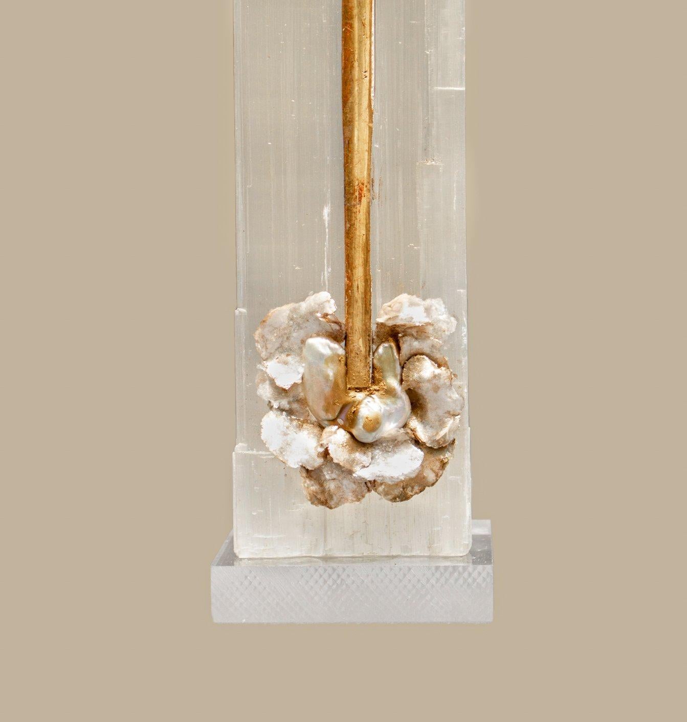 Ruler Selenite with an 18th century Italian gold leaf fragment sunray, mica, and natural forming baroque pearls on a lucite base. Ruler selenite or 