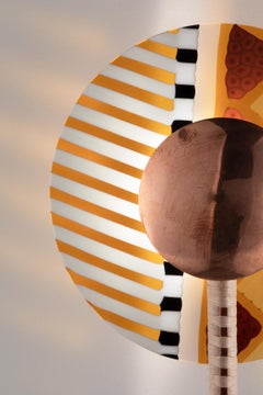 Rullo - wall lamp. Murrina, brass and woven rattan