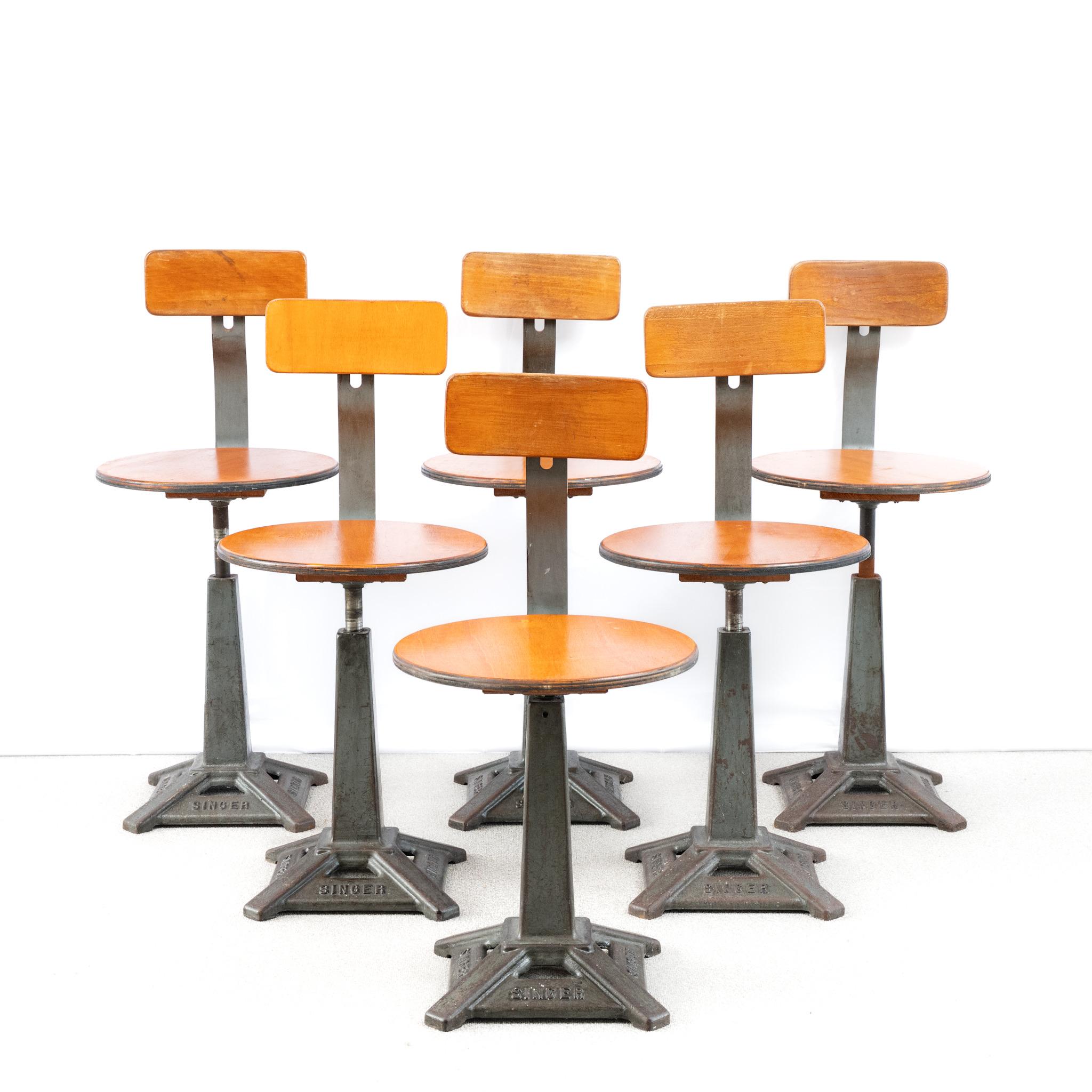 A rare set of 6 Singer Machinest Chairs.
Branded cast iron bases, bent ply backrest and the more unusual round seats of the earlier models.
Manufactured by 