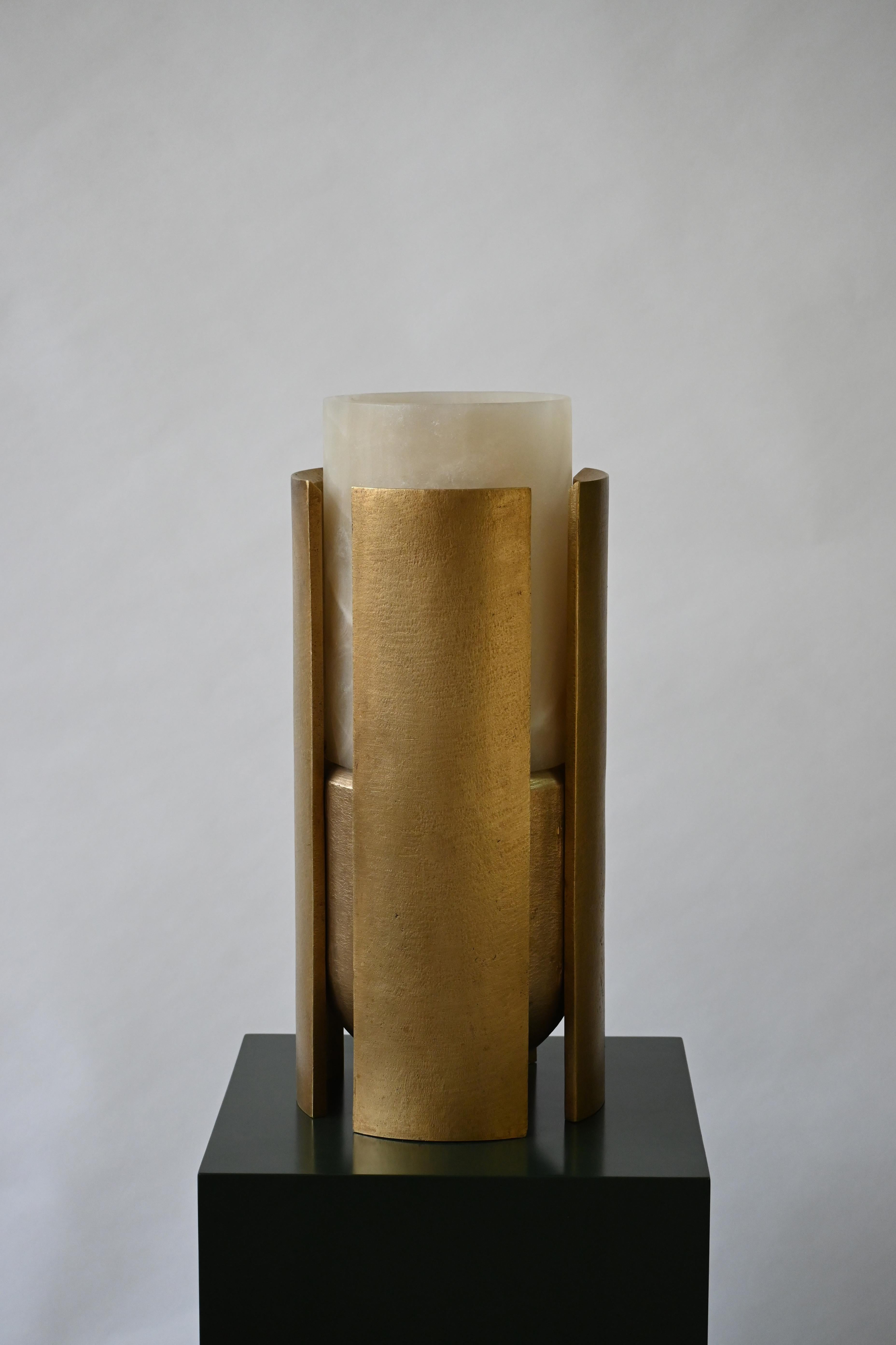 Runa Series Bronze Sculptural Vase 
By Deceres Studio
San Luis onyx and casted bronze
Limited Edition of 3
22D x 50H cm 
8.6D x 19.6H in

Runa is a sculptural vase inspired by ceremonial rituals of Latin America.
Elements of ceremonies, from the