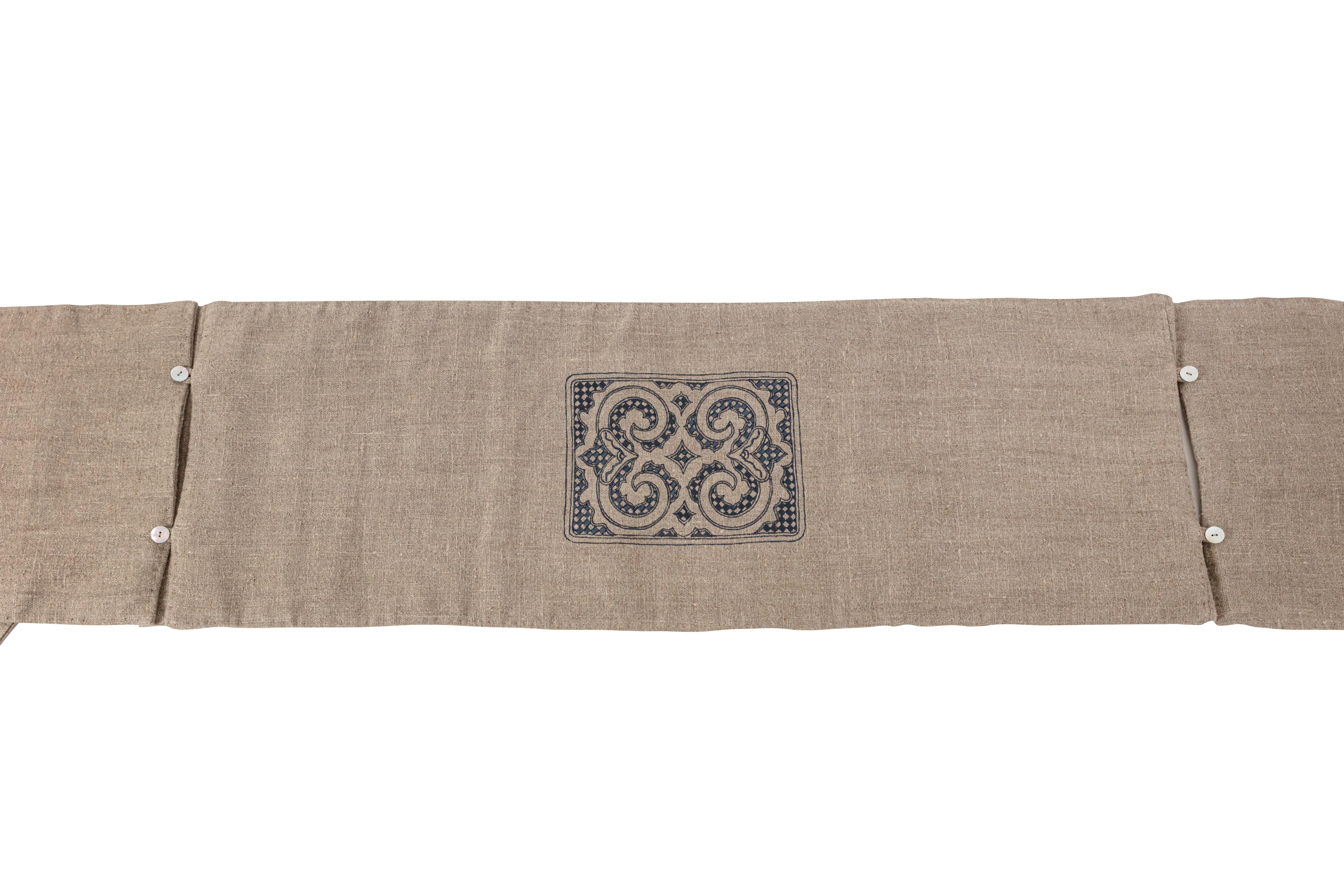 This hand-embroidered linen table runner from SoShiro’s Ainu collection, a collaboration between award-winning artist Toru Kaizawa and Shiro Muchiri, consists of three separate pieces, so it can be buttoned up to form an extra-long runner for larger